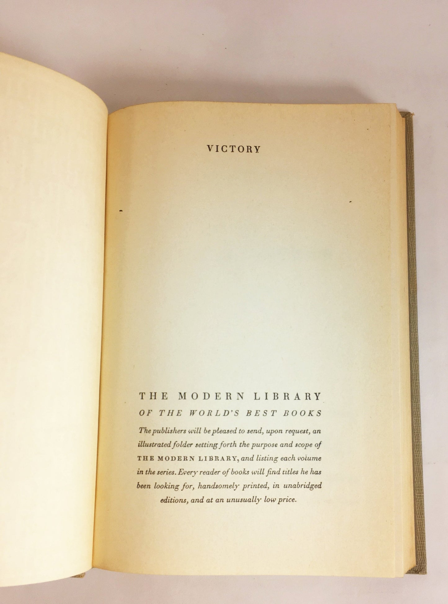 Victory by Joseph Conrad circa 1921. Psychological novel about a man who learned not to hope or love. Gray cloth covered Modern Library Book