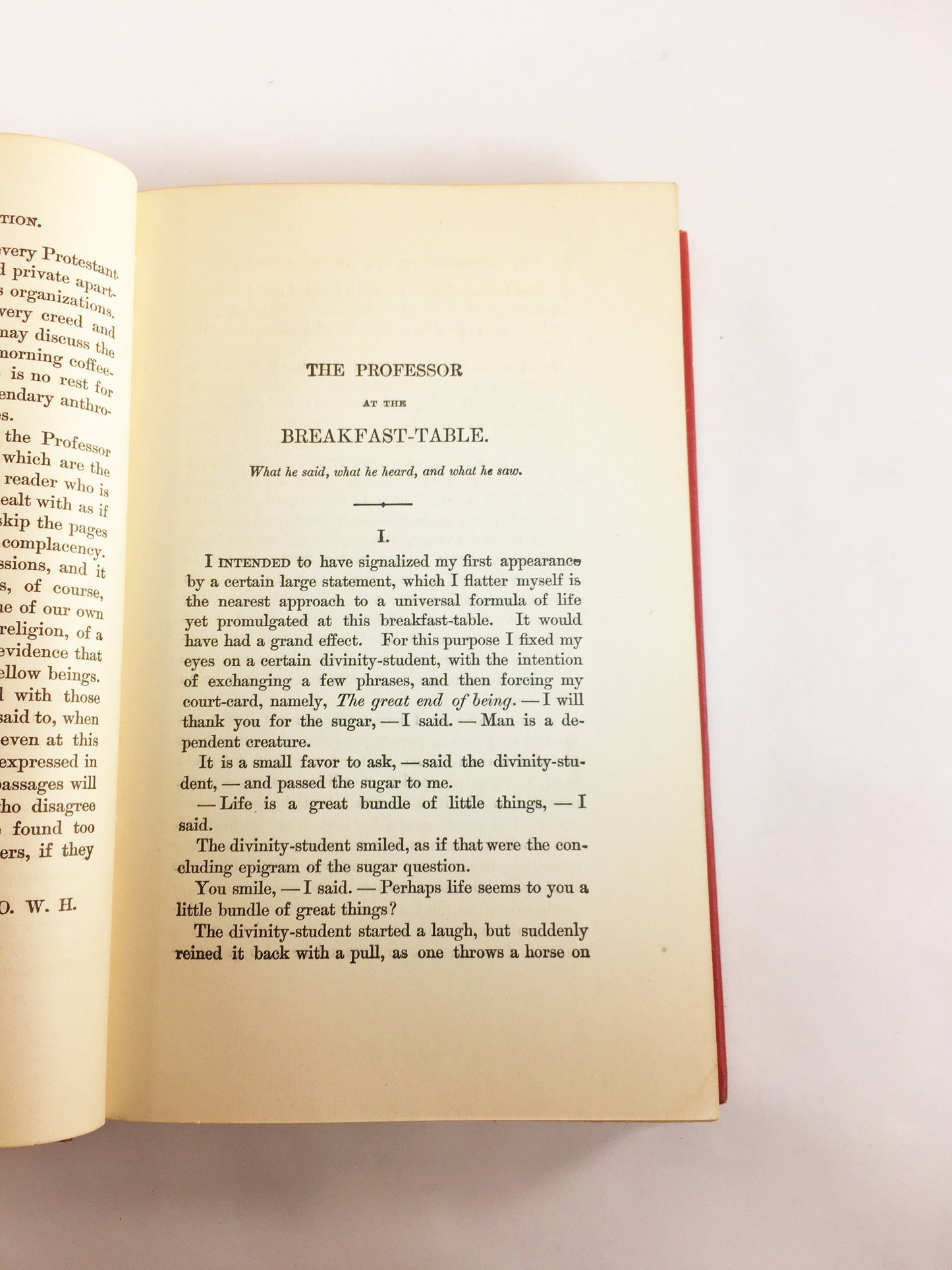 1892 Oliver Wendell Holmes The Autocrat Professor at the Breakfast Table. Vintage red book of a collection of essays. Decor prop staging