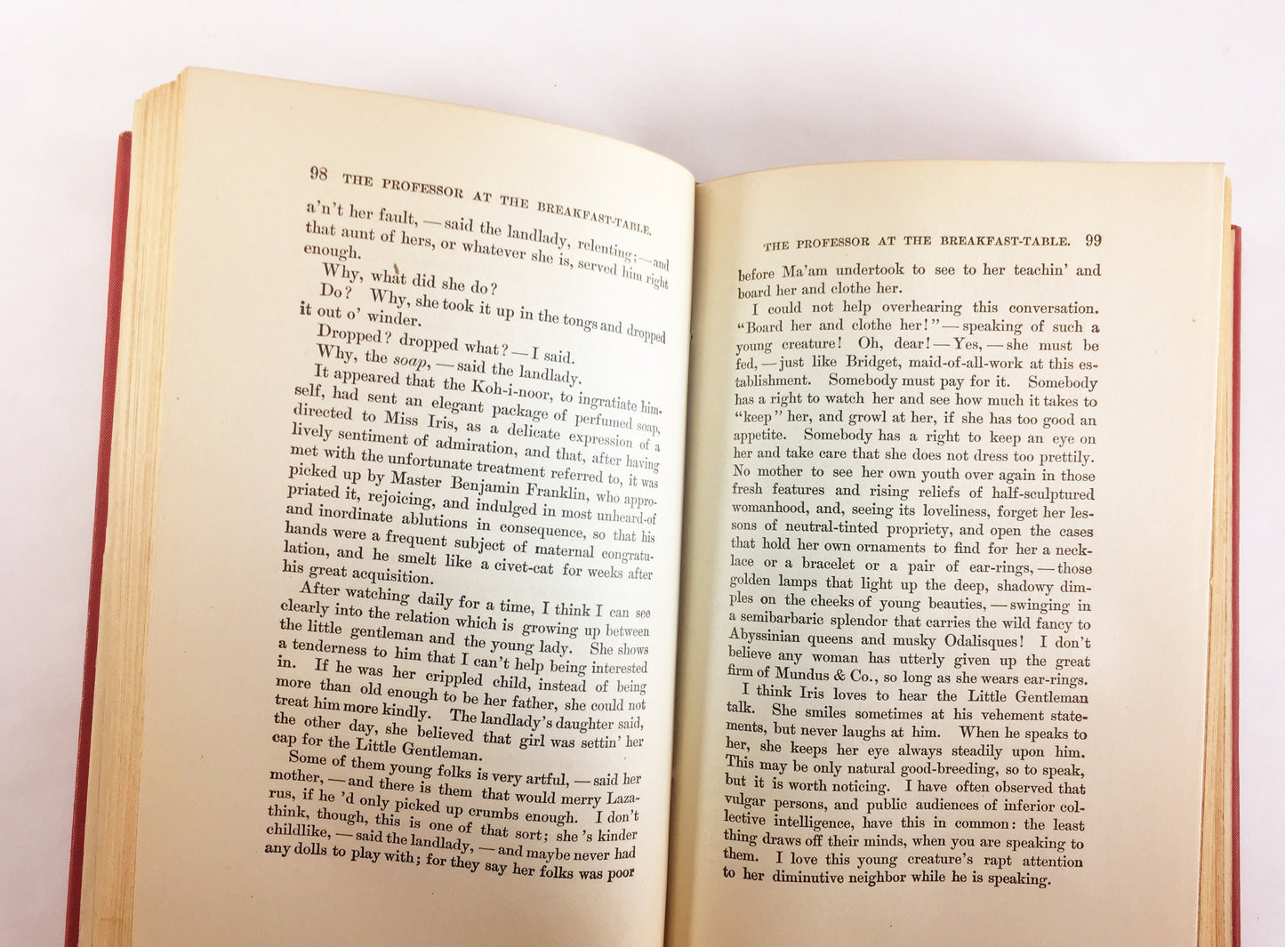 1892 Oliver Wendell Holmes The Autocrat Professor at the Breakfast Table. Vintage red book of a collection of essays. Decor prop staging