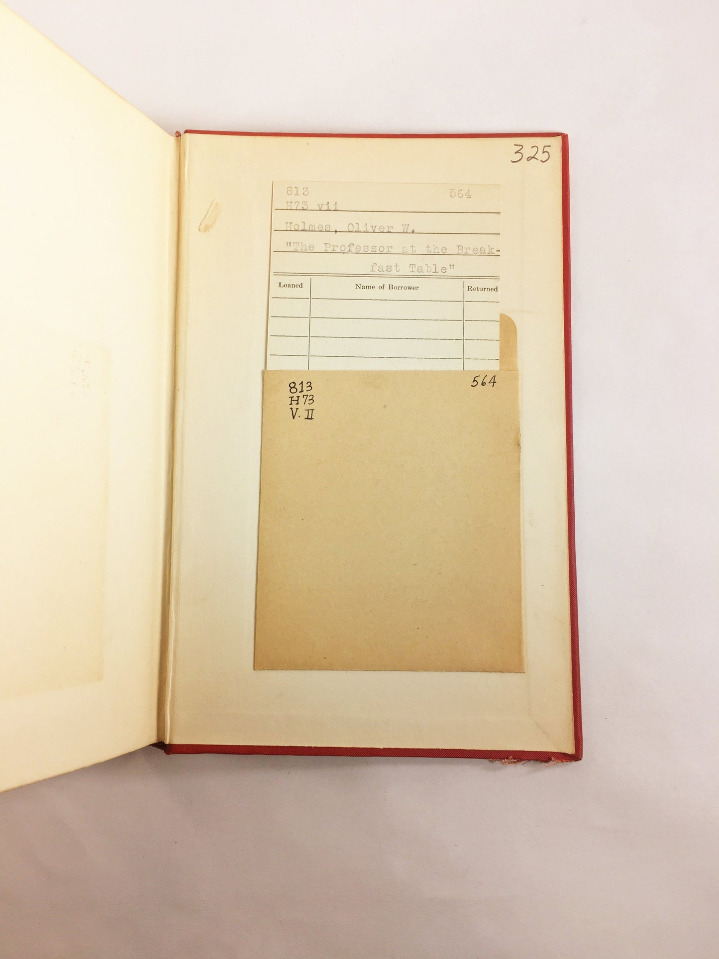 1892 Oliver Wendell Holmes The Autocrat Professor at the Breakfast Table. Vintage red book of a collection of essays. Decor prop staging