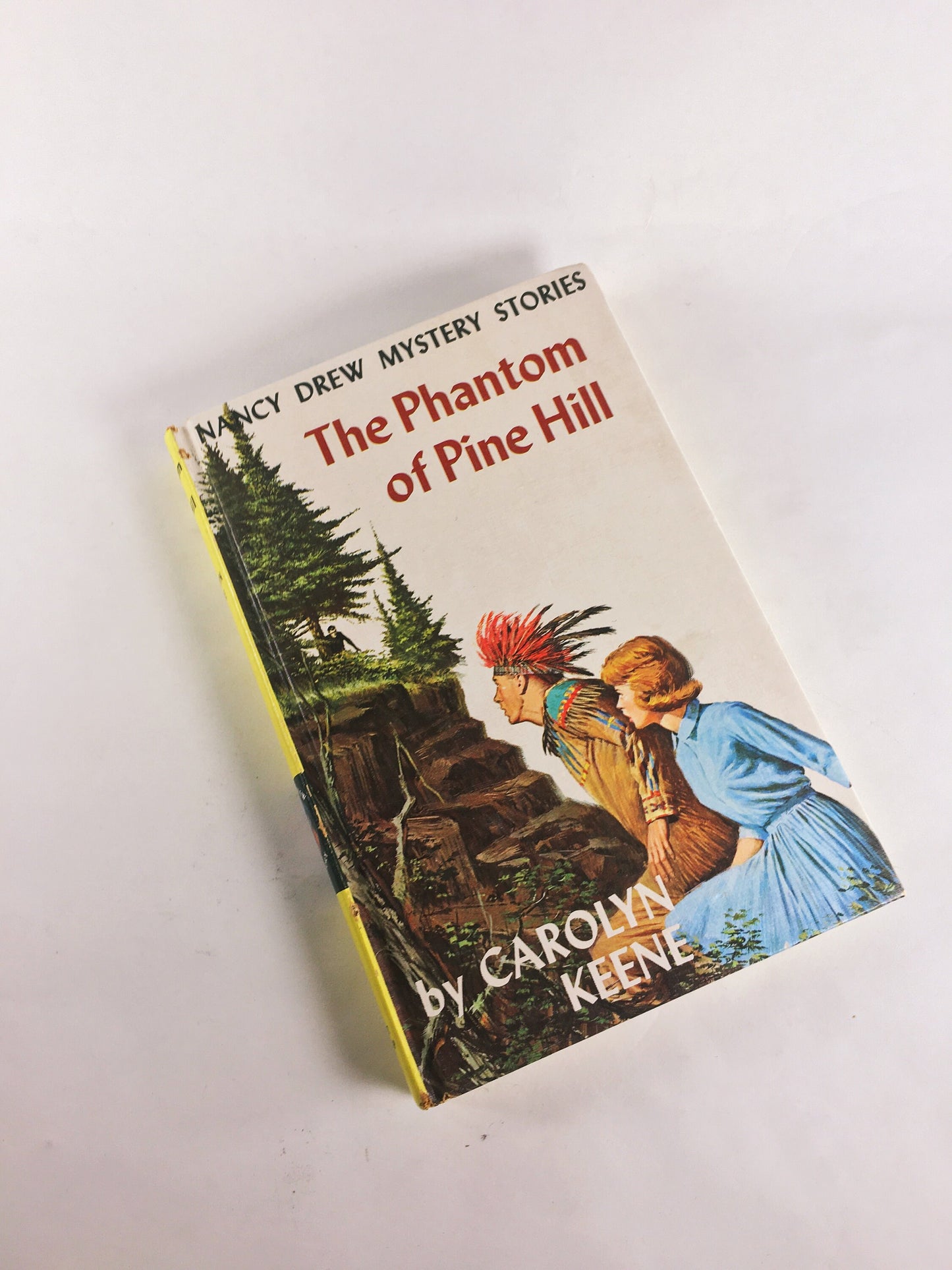 Nancy Drew Mystery Stories 1960s 1970 by Carolyn Keene. Vintage picture cover books with black & white endpapers. Teen tween reading yellow