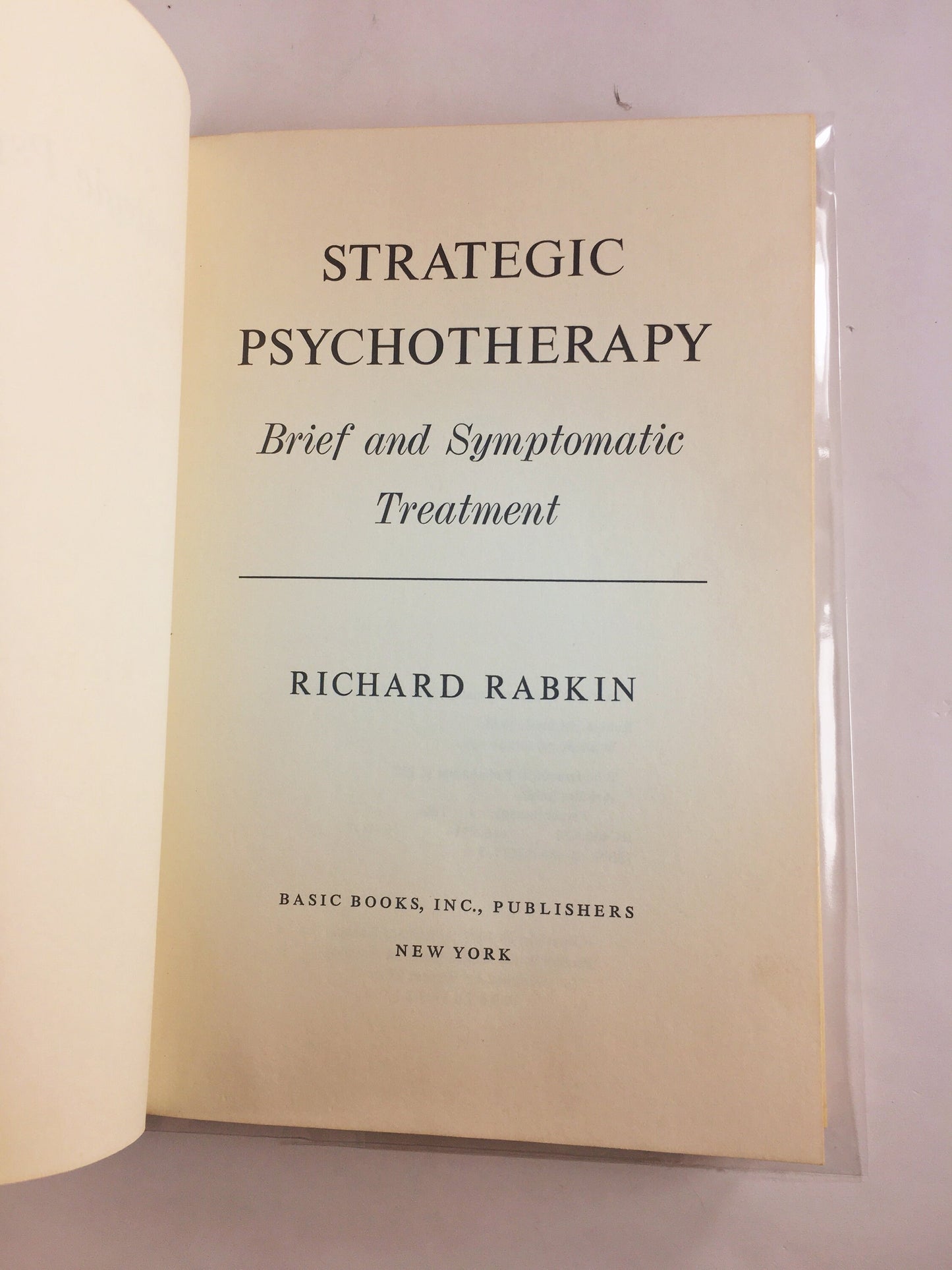 Strategic Psychotherapy by Richard Rabkin FIRST EDITION Vintage book circa 1977. Beige white home office bookshelf decor