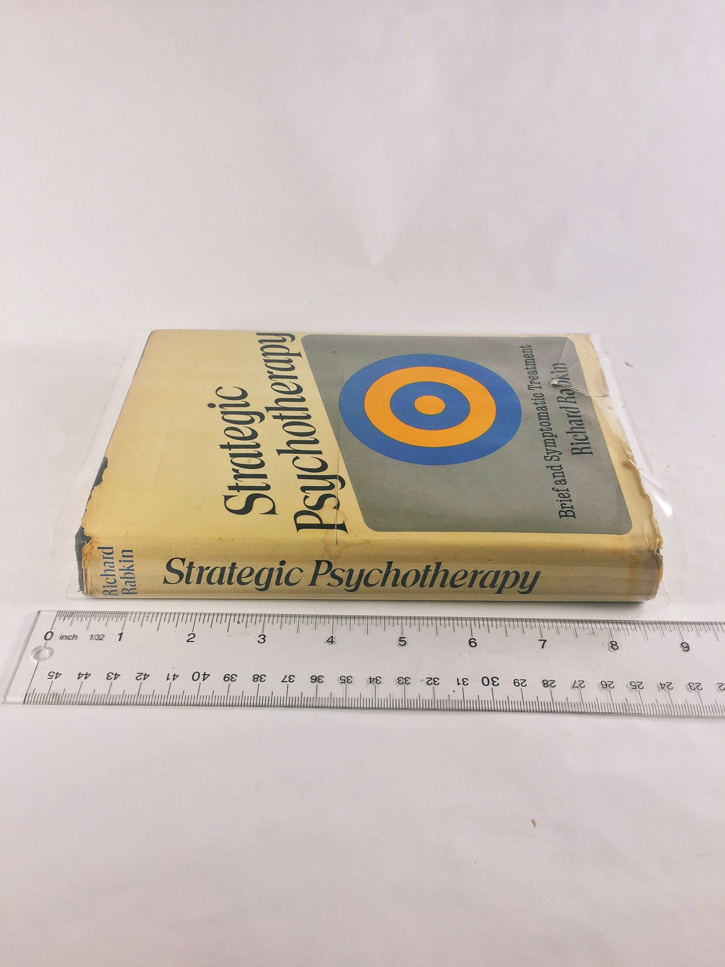 Strategic Psychotherapy by Richard Rabkin FIRST EDITION Vintage book circa 1977. Beige white home office bookshelf decor