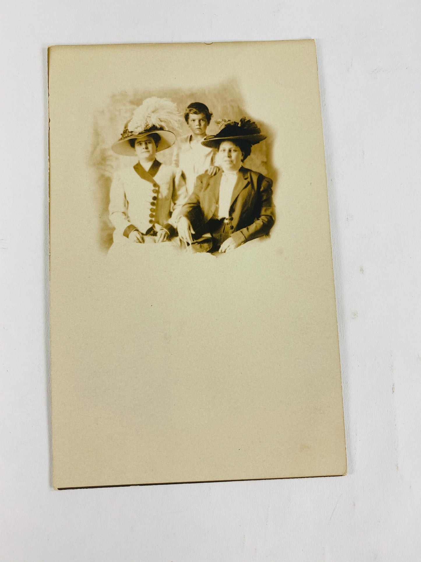 1908 vintage RPPC women postcard B&W stamped. BEAUTIFUL home office decor for framing. Flowers, Dress with hat and purse, family, standing