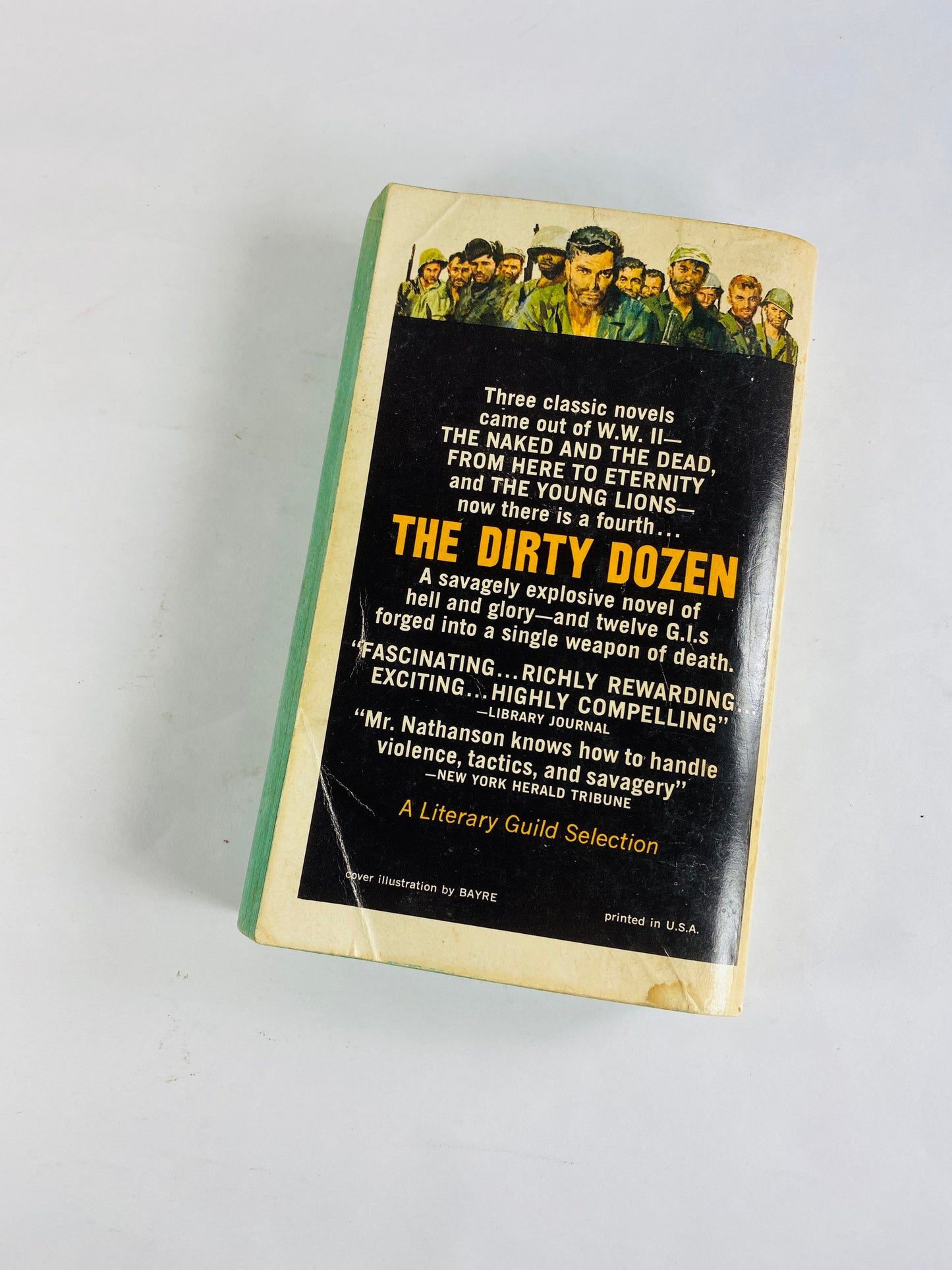 1966 Dirty Dozen vintage paperback book by EM Nathanson about violent criminals on a combat mission under the training Army major