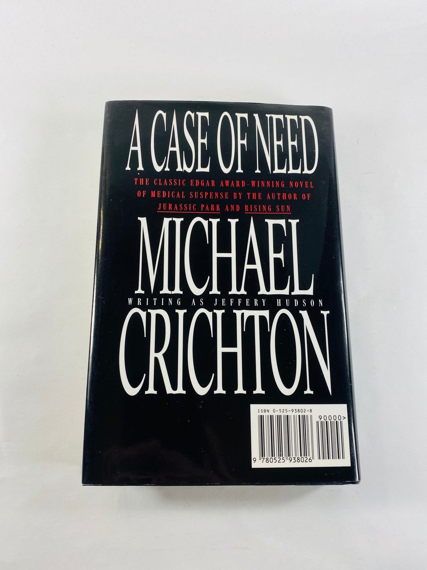 Case of Need by Michael Crichton Jeffery Hudson vintage book circa 1993. Edgar Award winner. Novel about surgery that ends in death