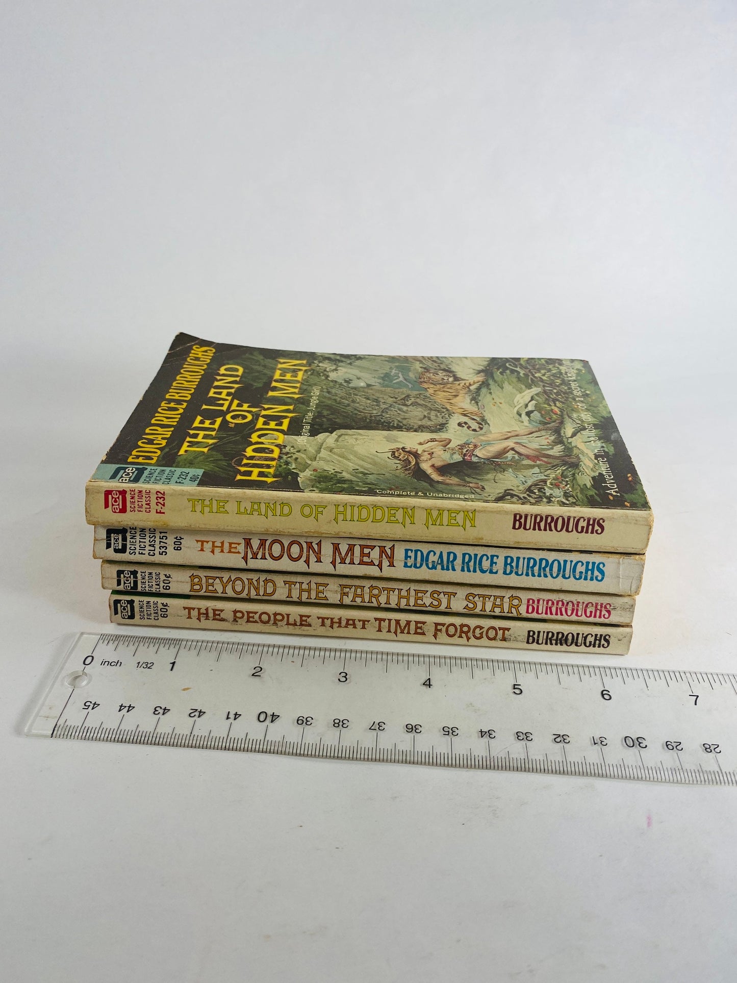 Edgar Rice Burroughs, author of Tarzan vintage paperback books People that Time Forgot Beyond Farthest Star Moon Men Land of Hidden Men