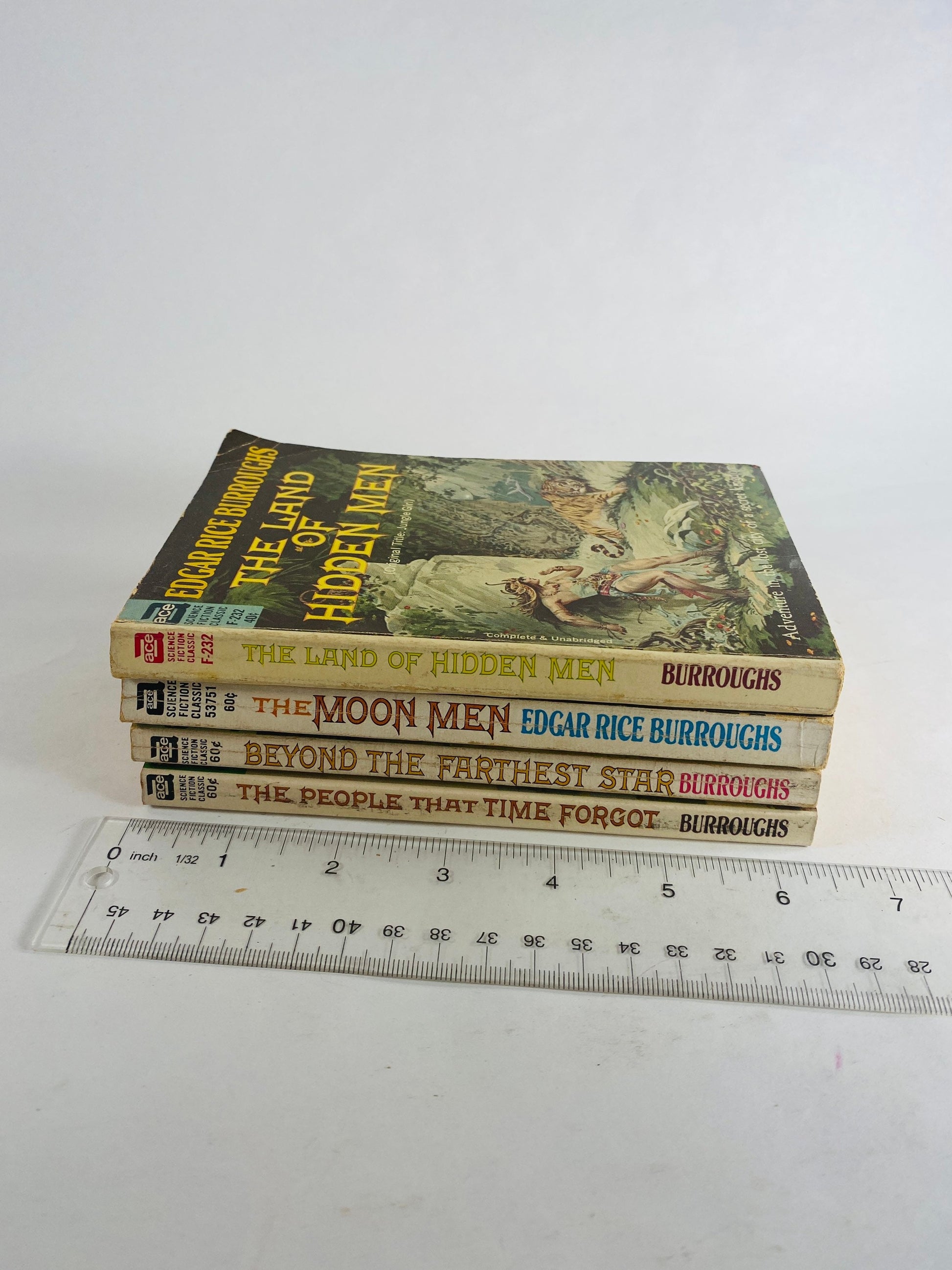 Edgar Rice Burroughs, author of Tarzan vintage paperback books People that Time Forgot Beyond Farthest Star Moon Men Land of Hidden Men