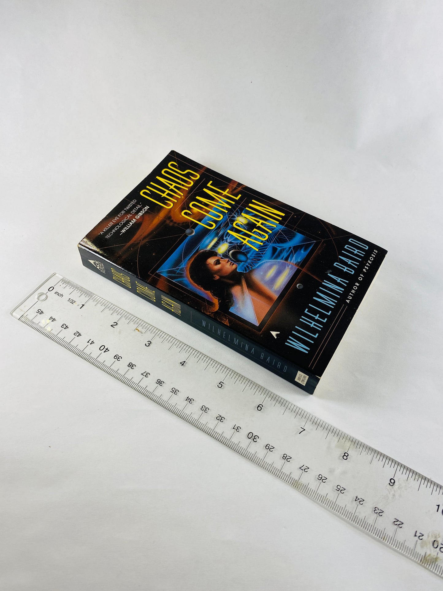 Chaos Come Again by Wilhemina Baird vintage paperback book 1997 about symbiotes in a telepathic evolution. Science fiction female author