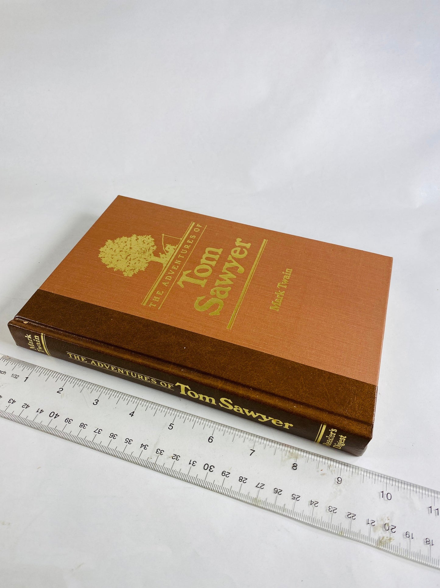 Adventures of Tom Sawyer by Samuel Clemens Mark Twain Vintage Reader's Digest book circa 1986. Brown & gold bookshelf decor