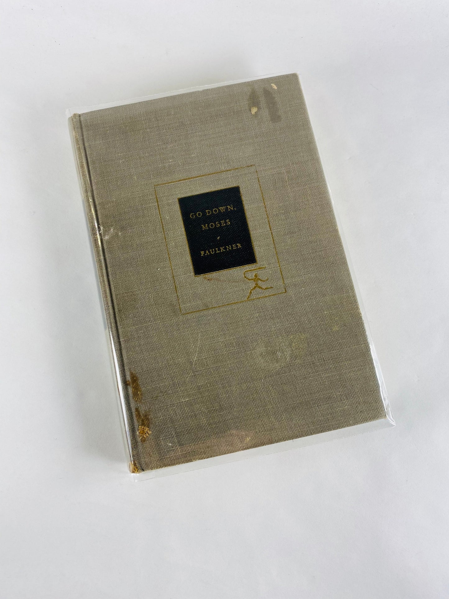 1946 William Faulkner Go Down Moses vintage Modern Library book Short stories which comprise one novel Gray bookshelf decor Stocking stuffer