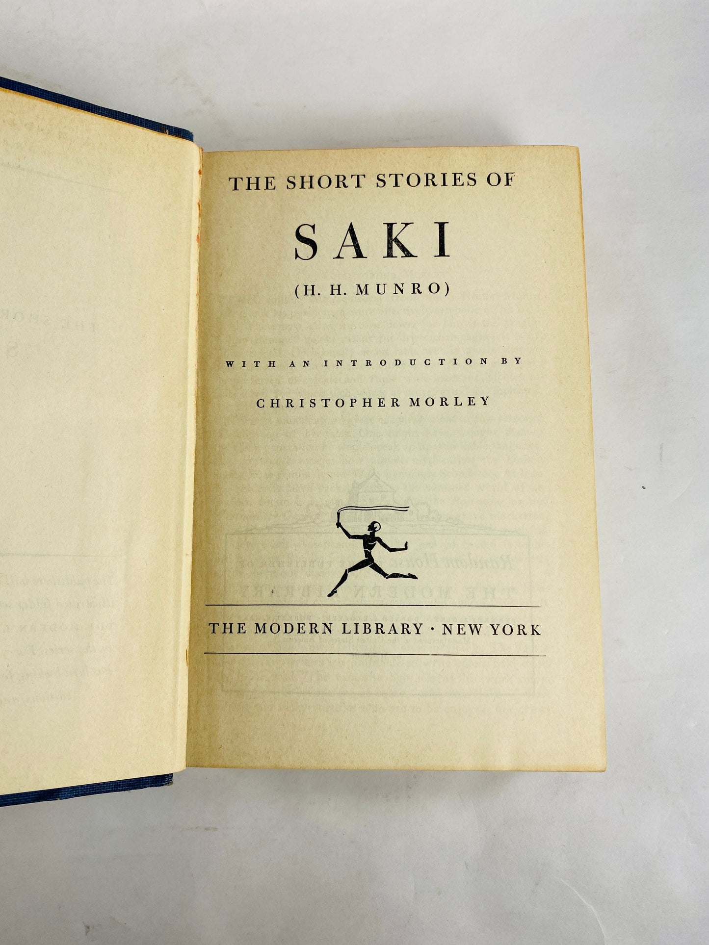 Short Stories of Saki Modern Library book circa 1930 HM Munro Master of the short story. Parody. Indigo Blue bookshelf decor