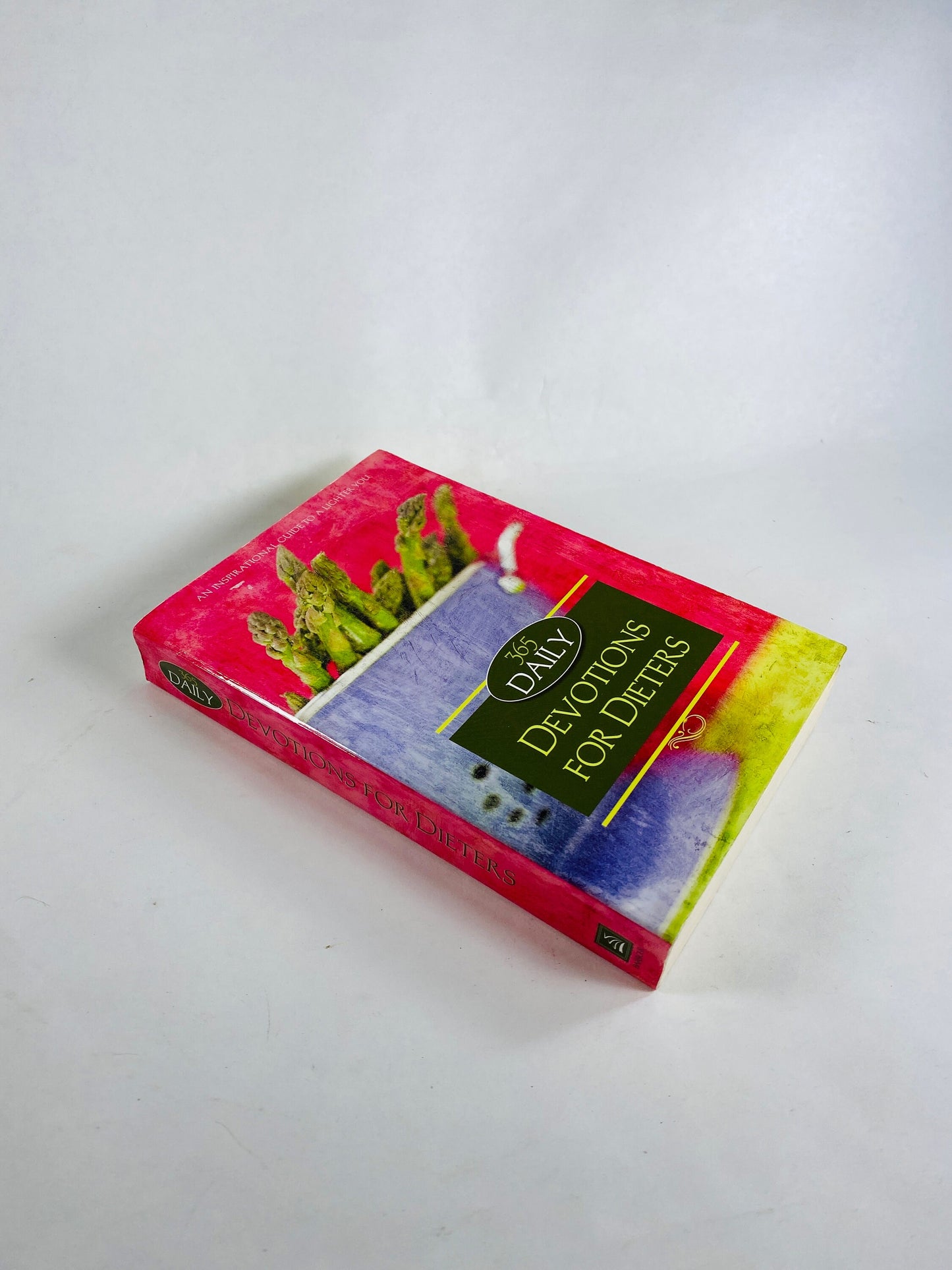 Daily Devotions for Dieters vintage paperback book with Christian inspirations for weight loss and strength motivation.