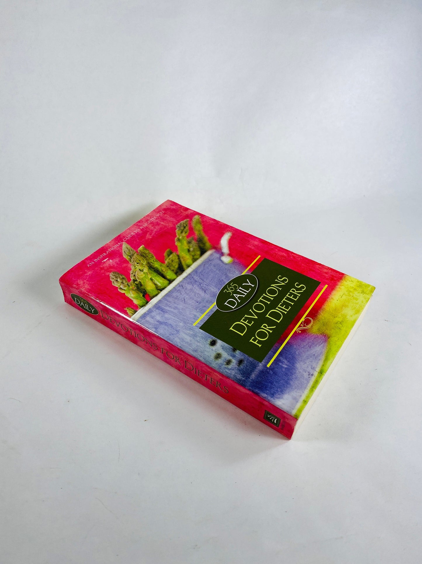 Daily Devotions for Dieters vintage paperback book with Christian inspirations for weight loss and strength motivation.