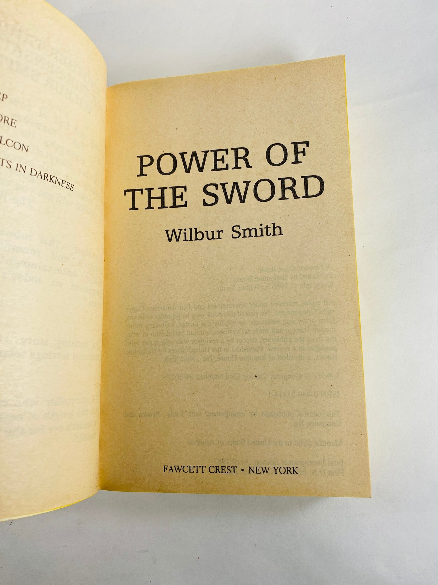 1987 Power of the Sword Vintage paperback Book war novel by Wilbur Smith military combat paperback book about World War II.