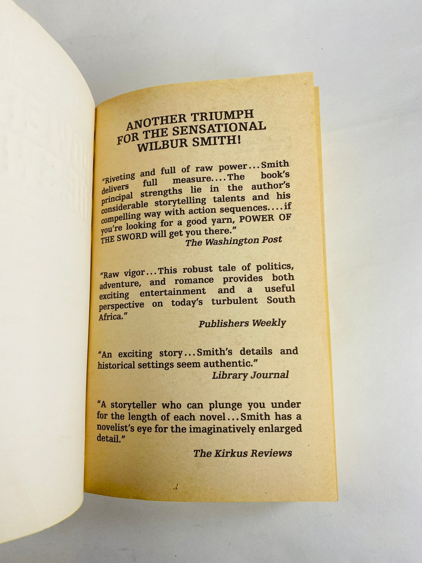 1987 Power of the Sword Vintage paperback Book war novel by Wilbur Smith military combat paperback book about World War II.
