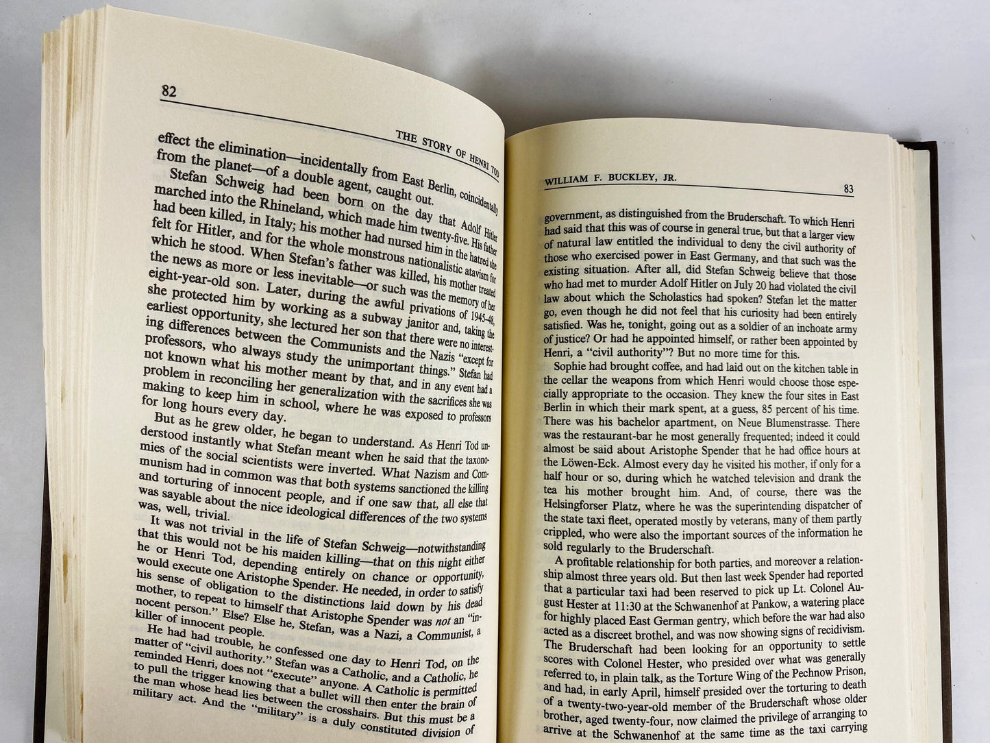 Story of Henri Tod by William F Buckley vintage book circa 1984 set in East Germany. Brown bookshelf decor