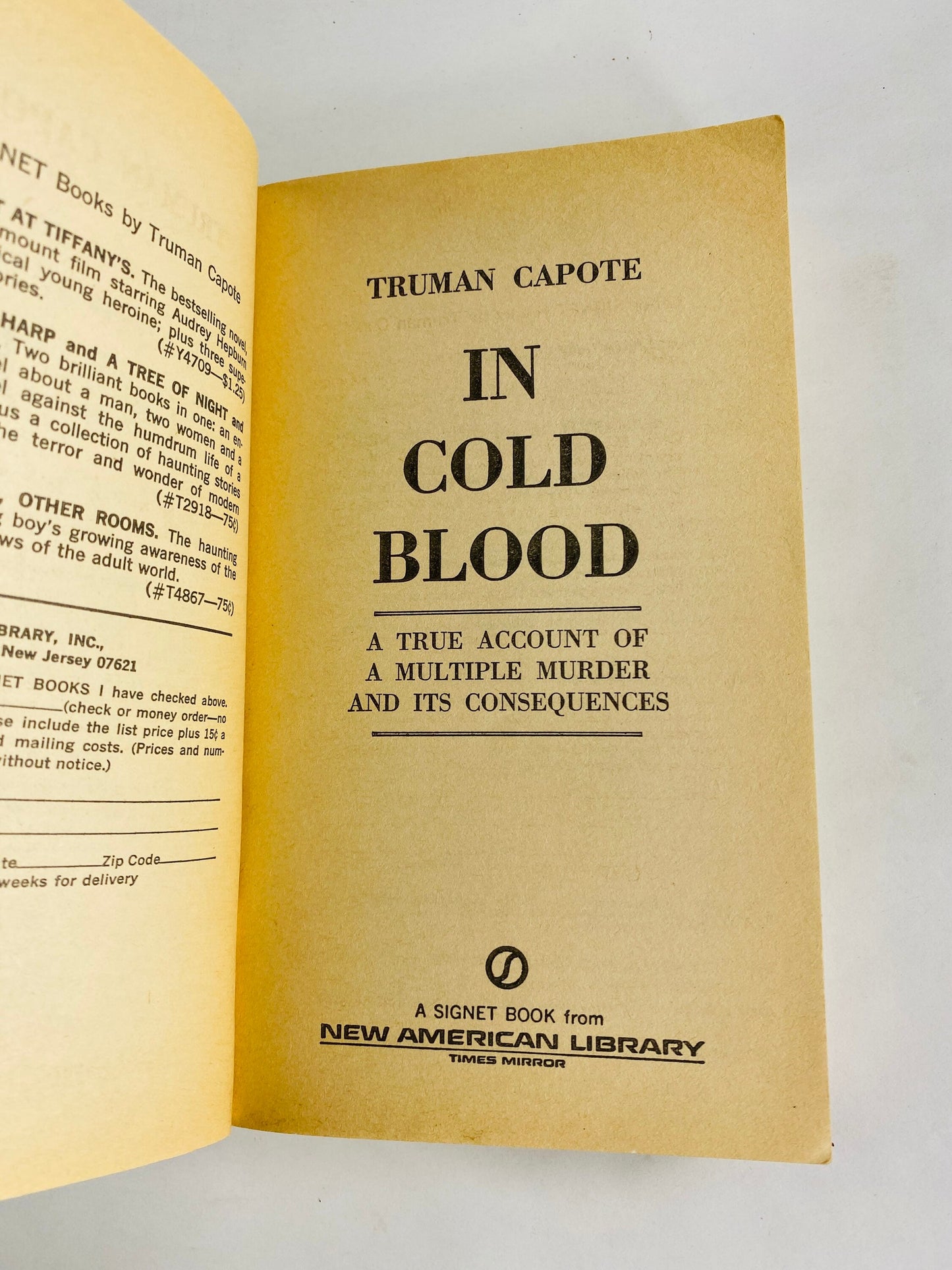Truman Capote In Cold Blood Vintage paperback book circa 1965. True Account of a Multiple Murder and its Consequences. Signet