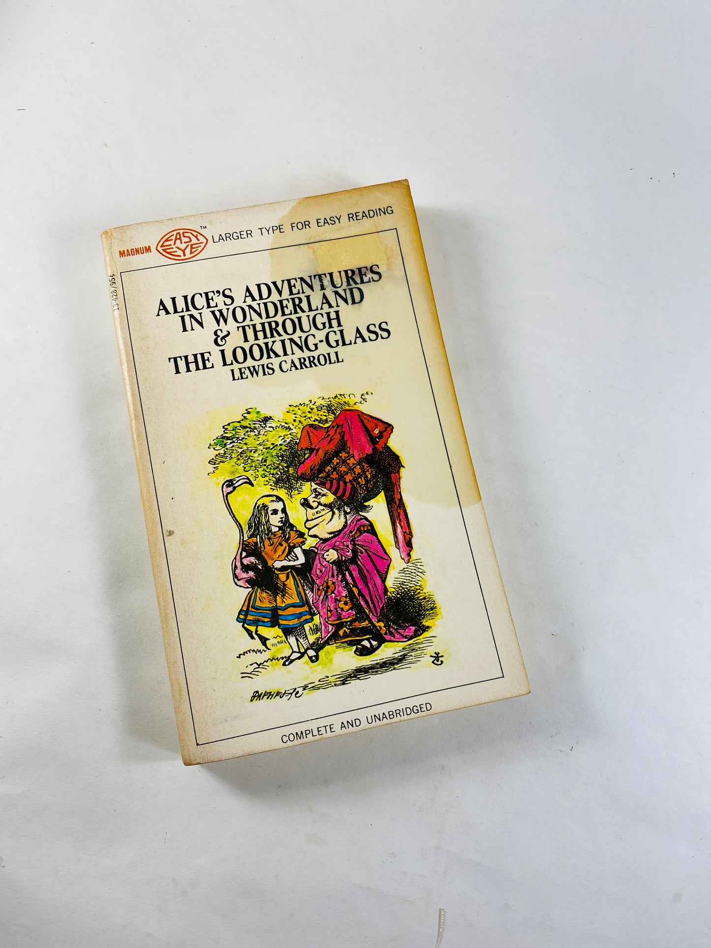 1968 Alice's Adventures in Wonderland & Through the Looking Glass Vintage paperback book by Lewis Carroll.