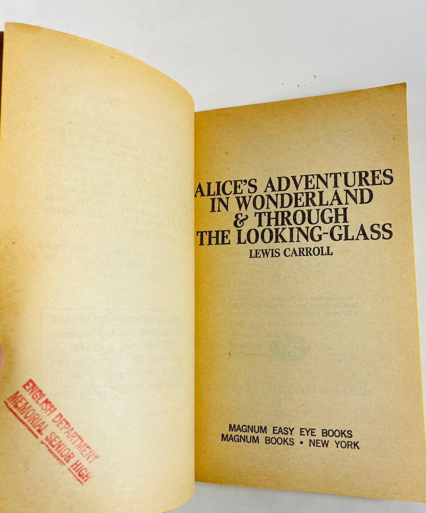 1968 Alice's Adventures in Wonderland & Through the Looking Glass Vintage paperback book by Lewis Carroll.