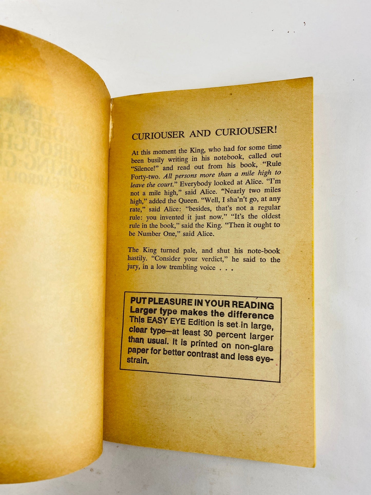 1968 Alice's Adventures in Wonderland & Through the Looking Glass Vintage paperback book by Lewis Carroll.