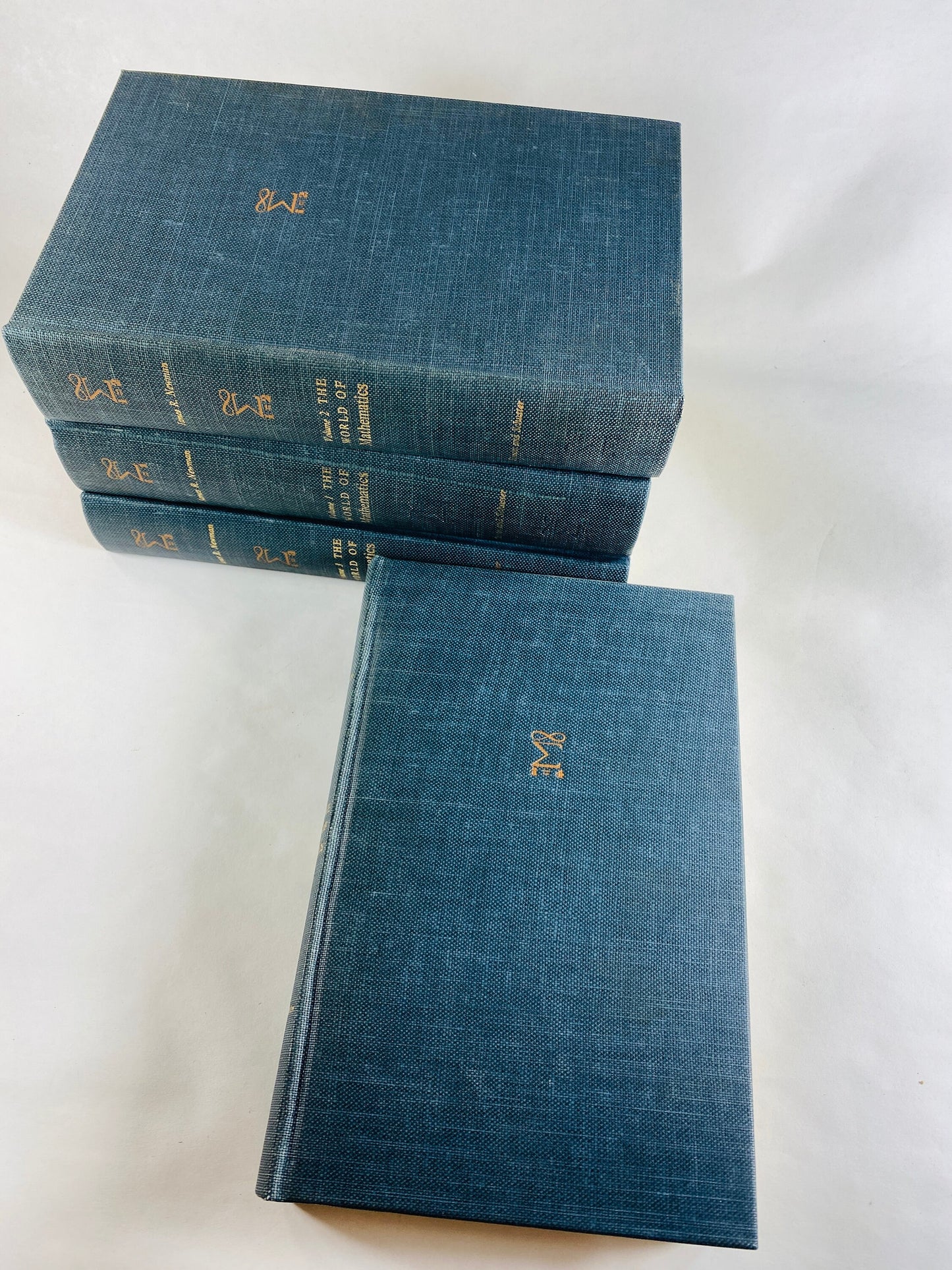World of Mathematics FIRST EDITION vintage book set circa 1956 by James Newman Four volume lot Literature Einstein bookshelf decor blue