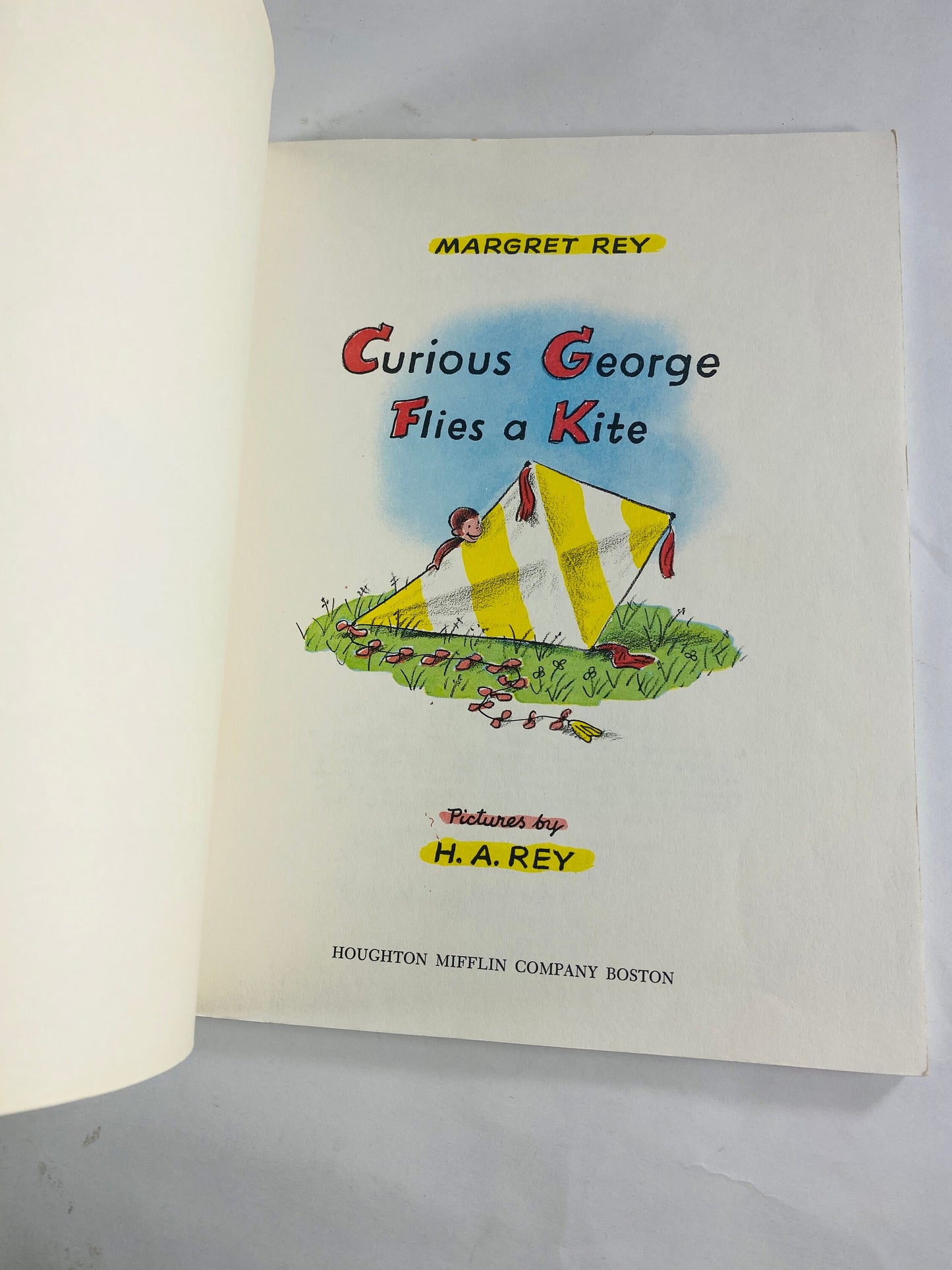 1971 Curious George Flies a Kite Vintage Scholastic paperback book by HA Rey Elementary school reader home decor