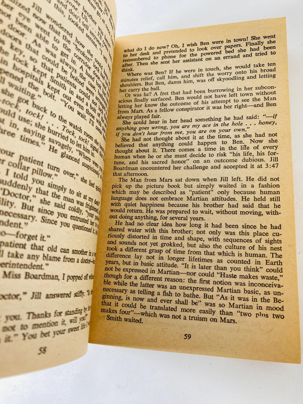 Stranger in a Strange Land by Robert Heinlein vintage paperback book featuring famous GROK artwork science fiction classic