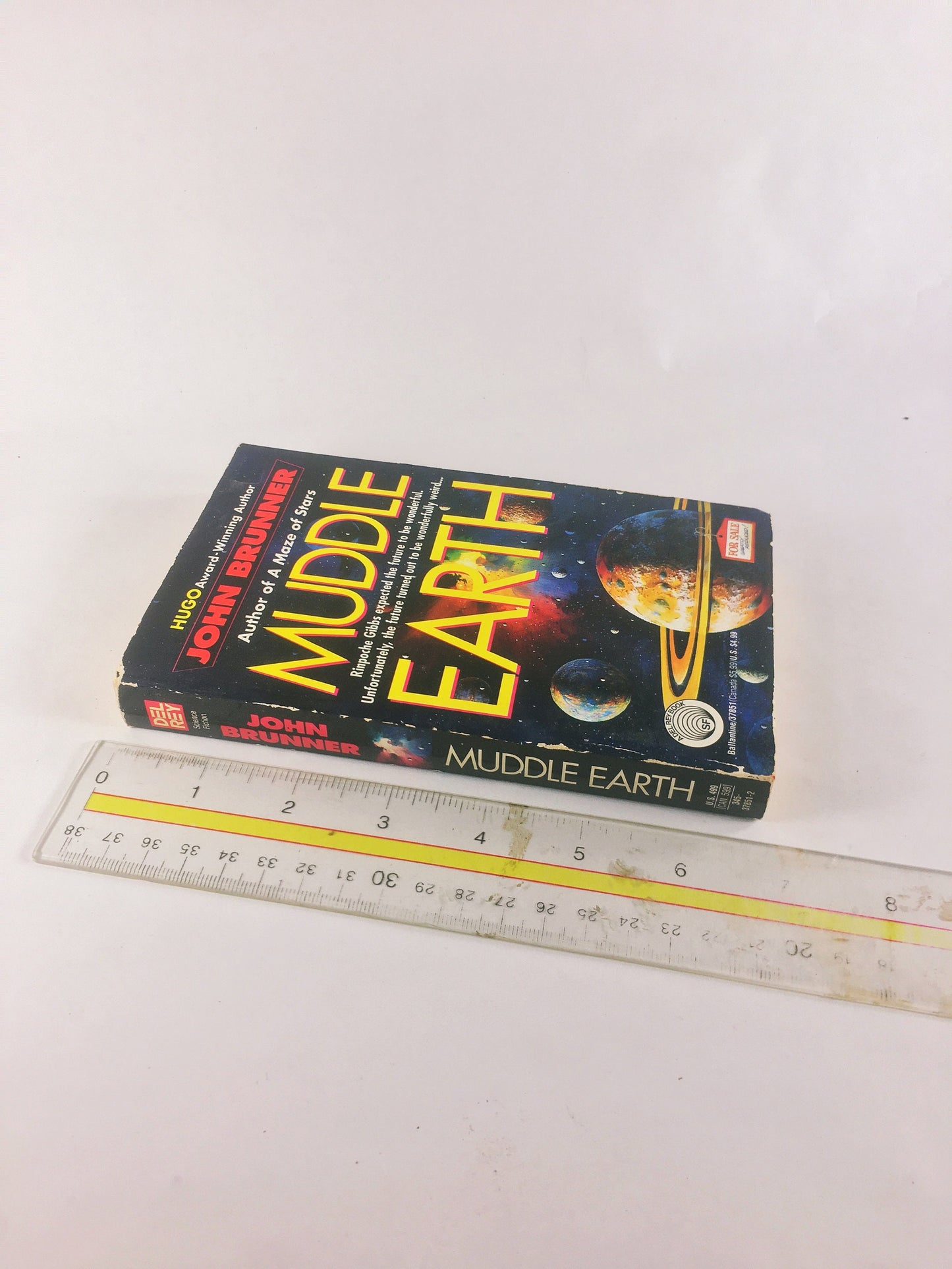 1993 Muddle Earth by John Brunner Science fiction book a man awakened from cryogenic suspension in the 24th century. Time Travel