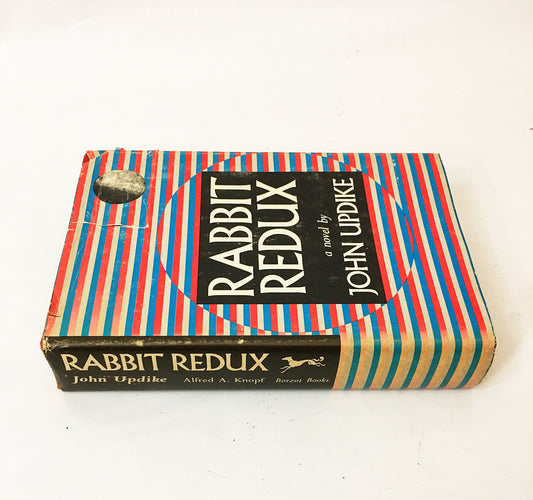 Rabbit Redux by John Updike. First Edition vintage book circa 1971. Spiritual quest of impulsive former athlete. Updike's Masterpiece. Gift