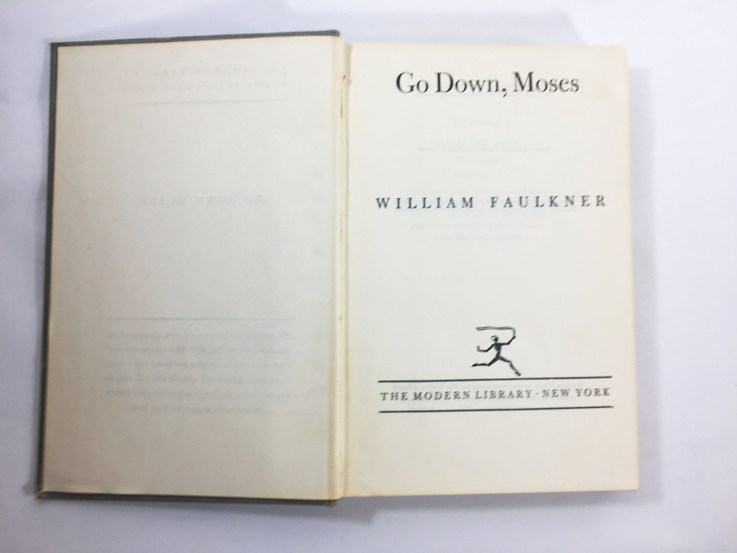 1946 William Faulkner Go Down Moses vintage Modern Library book Short stories which comprise one novel Gray bookshelf decor Stocking stuffer