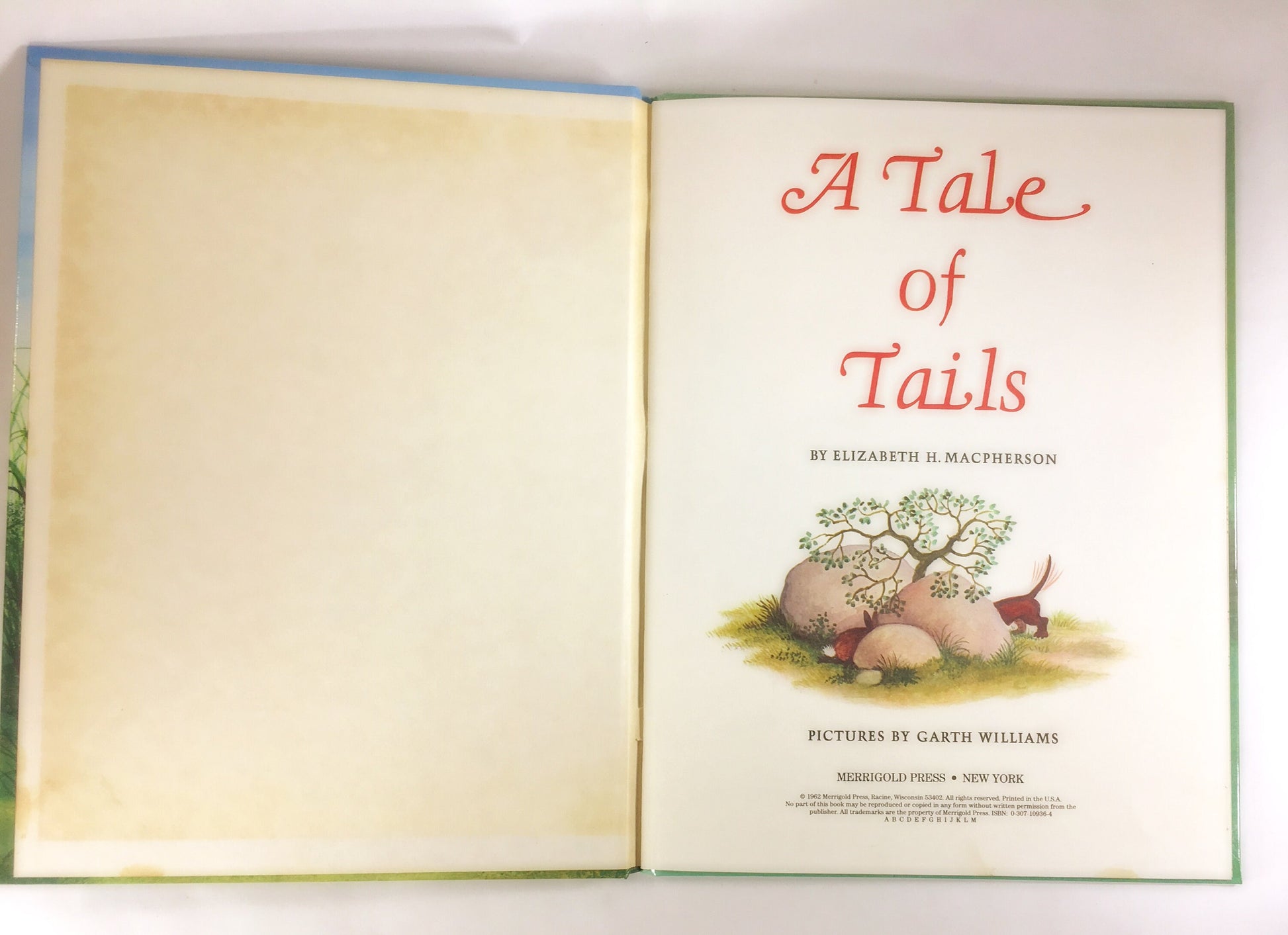 1962 Tale of Tails illustrated by Garth Williams. Vintage Easter Bunny book by Elizabeth Macpherson. Children's basket nursery decor