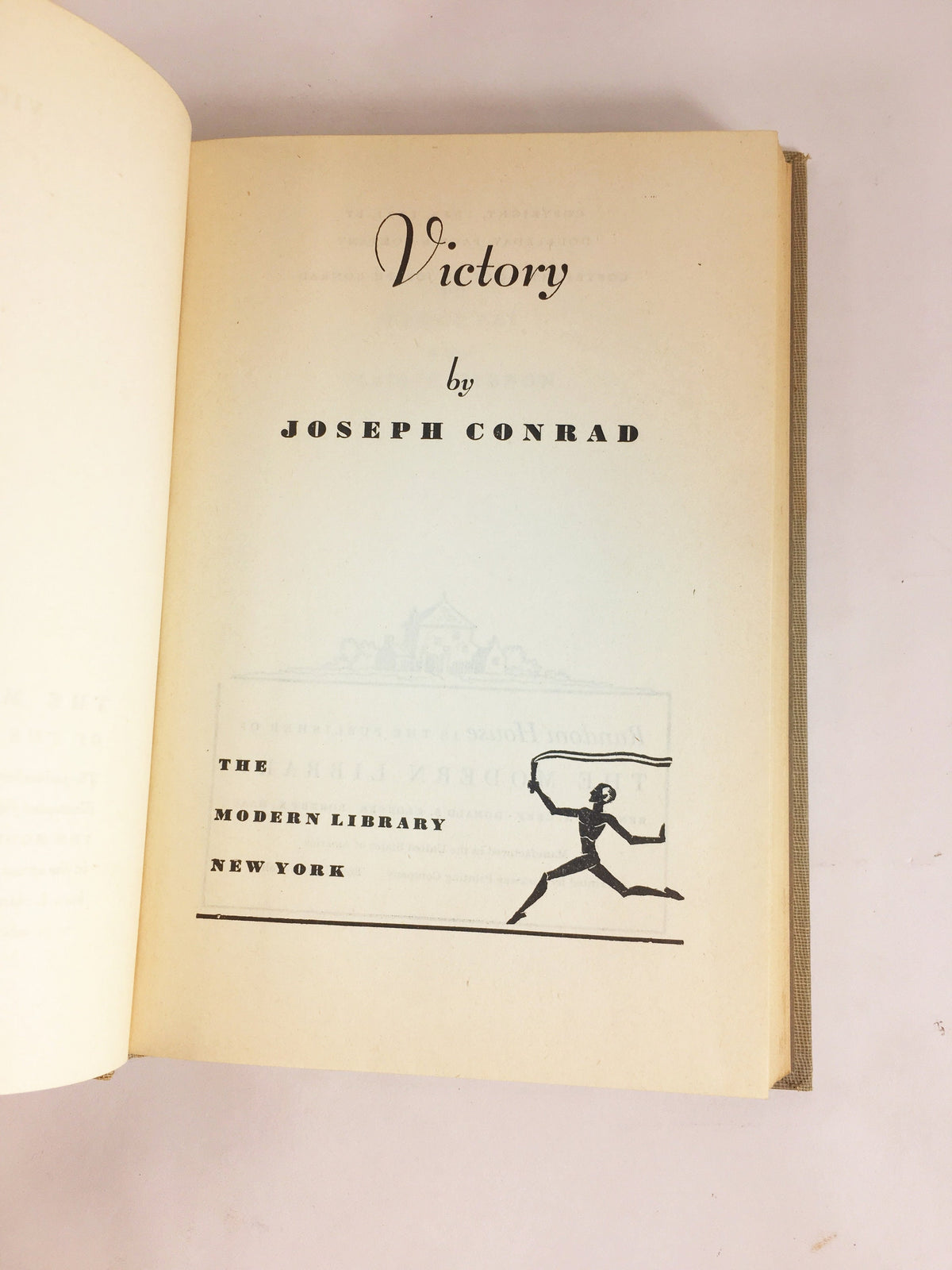 Victory by Joseph Conrad circa 1921. Psychological novel about a man who learned not to hope or love. Gray cloth covered Modern Library Book