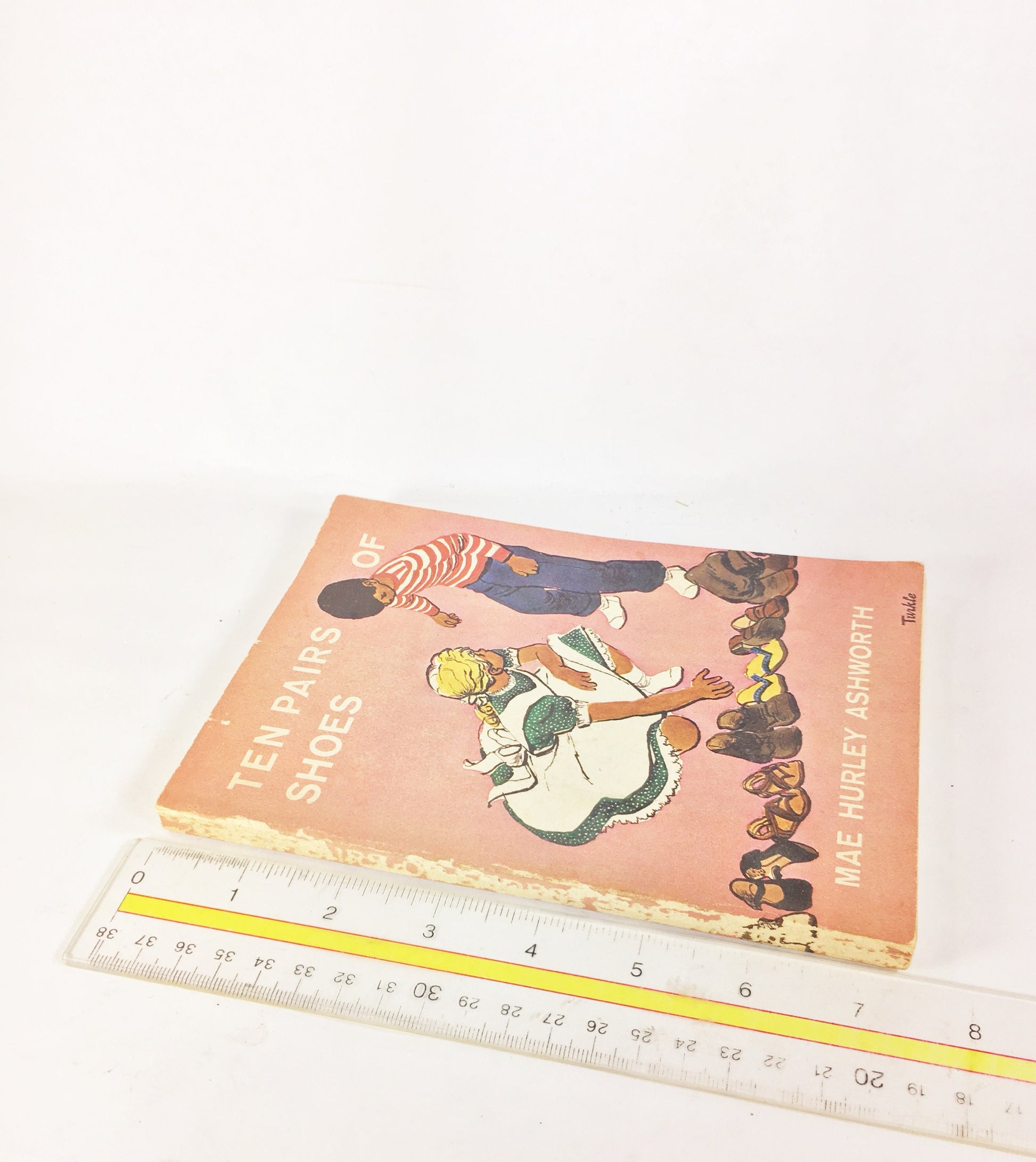 Ten Pairs of Shoes EARLY PRINTING vintage pink paperback book circa 1958 by Mae Ashworth. Children's story of living in someone else's shoes