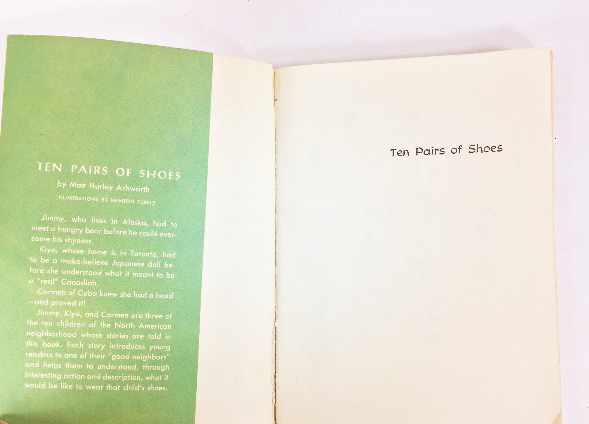 Ten Pairs of Shoes EARLY PRINTING vintage pink paperback book circa 1958 by Mae Ashworth. Children's story of living in someone else's shoes