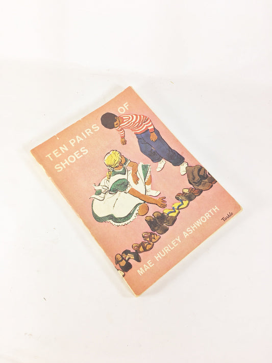 Ten Pairs of Shoes EARLY PRINTING vintage pink paperback book circa 1958 by Mae Ashworth. Children's story of living in someone else's shoes