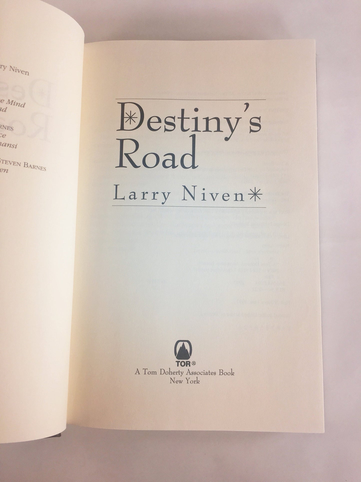 Destiny's Road FIRST EDITION vintage black book by Larry Niven circa 1997. Scifi story of a man living on a long abandoned Earth colony