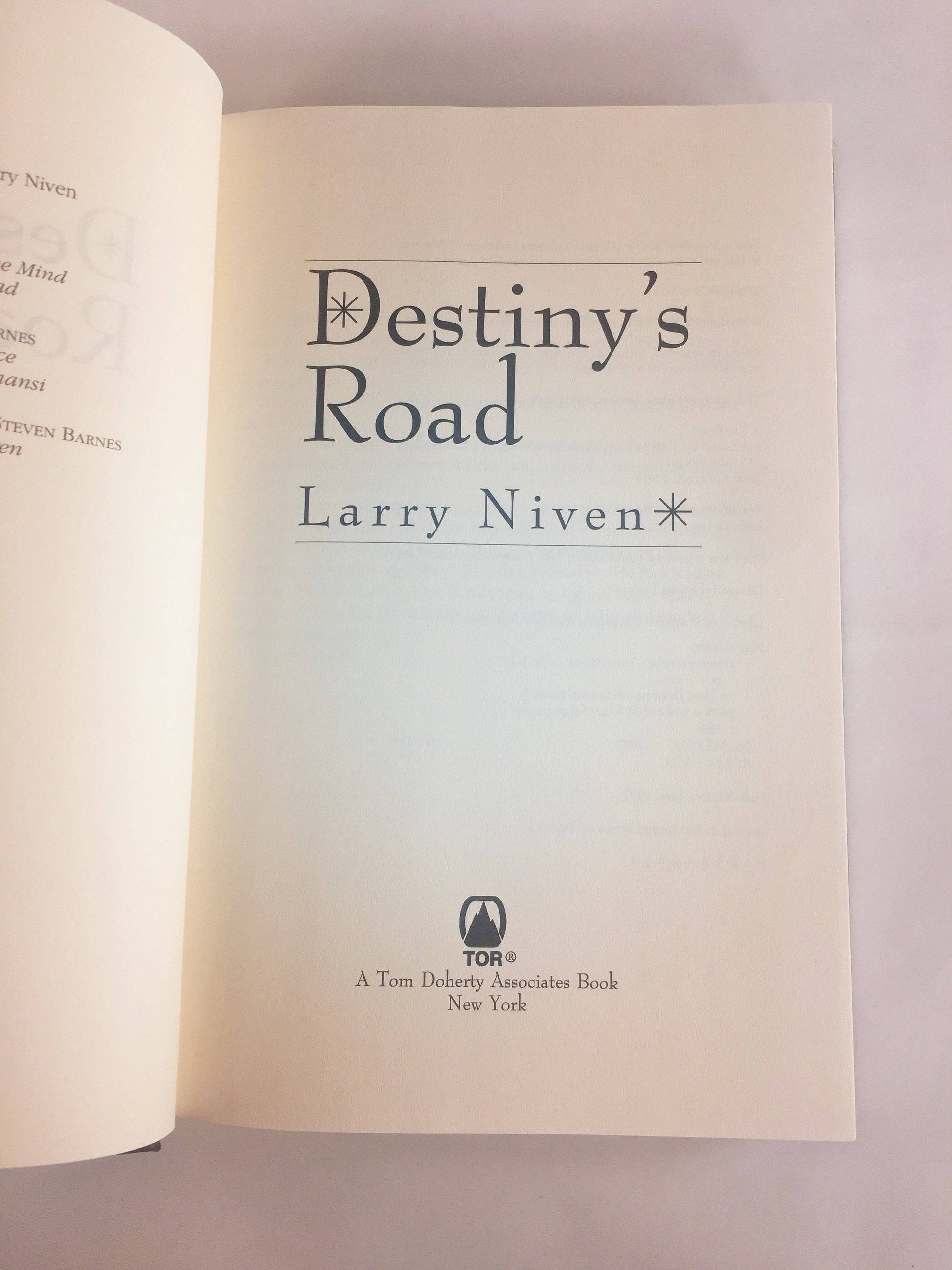 Destiny's Road FIRST EDITION vintage black book by Larry Niven circa 1997. Scifi story of a man living on a long abandoned Earth colony