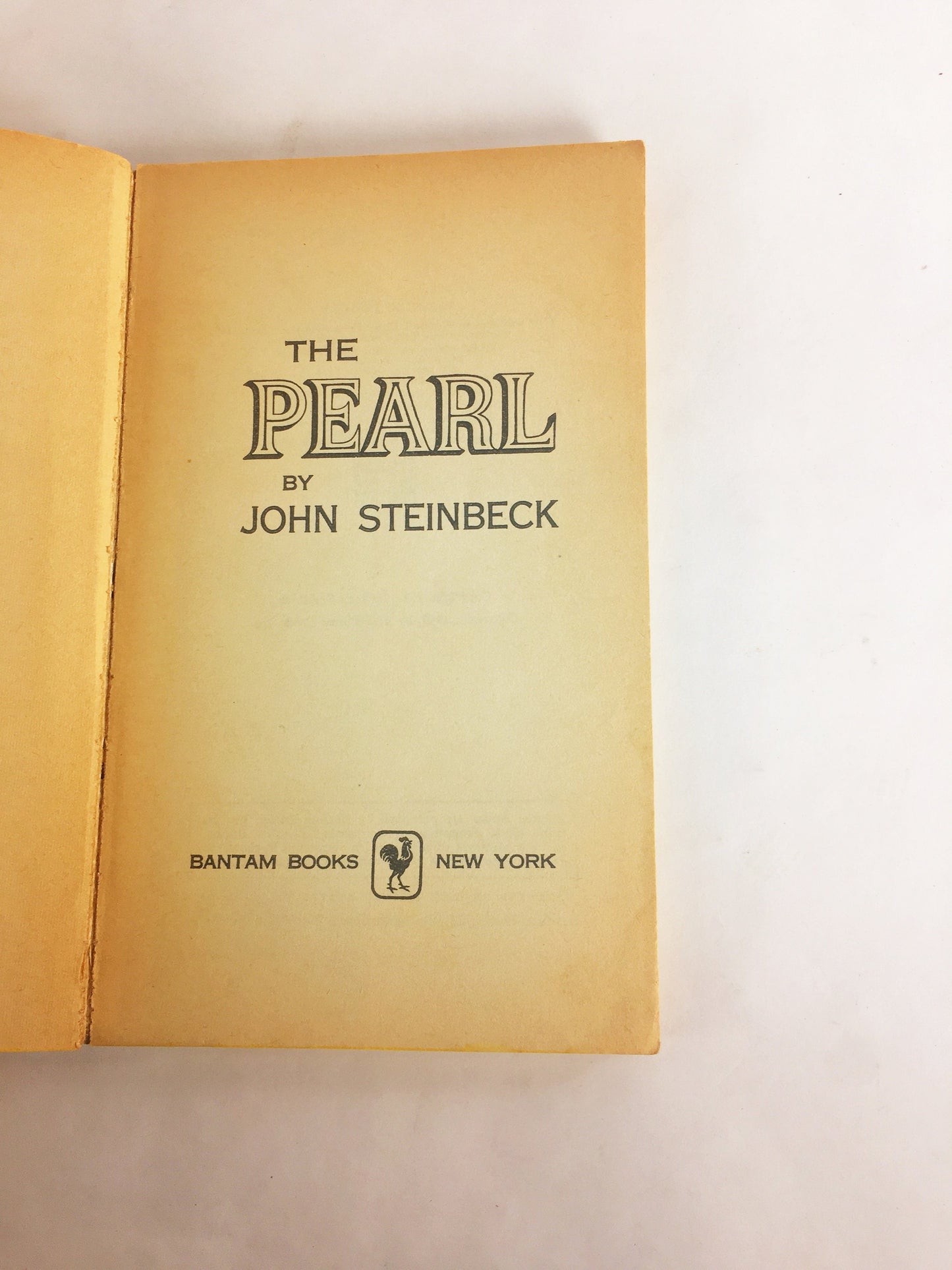 John Steinbeck The Pearl. EARLY PRINTING vintage Bantam paperback book circa 1956. Greed, defiance of societal norms, and evil.