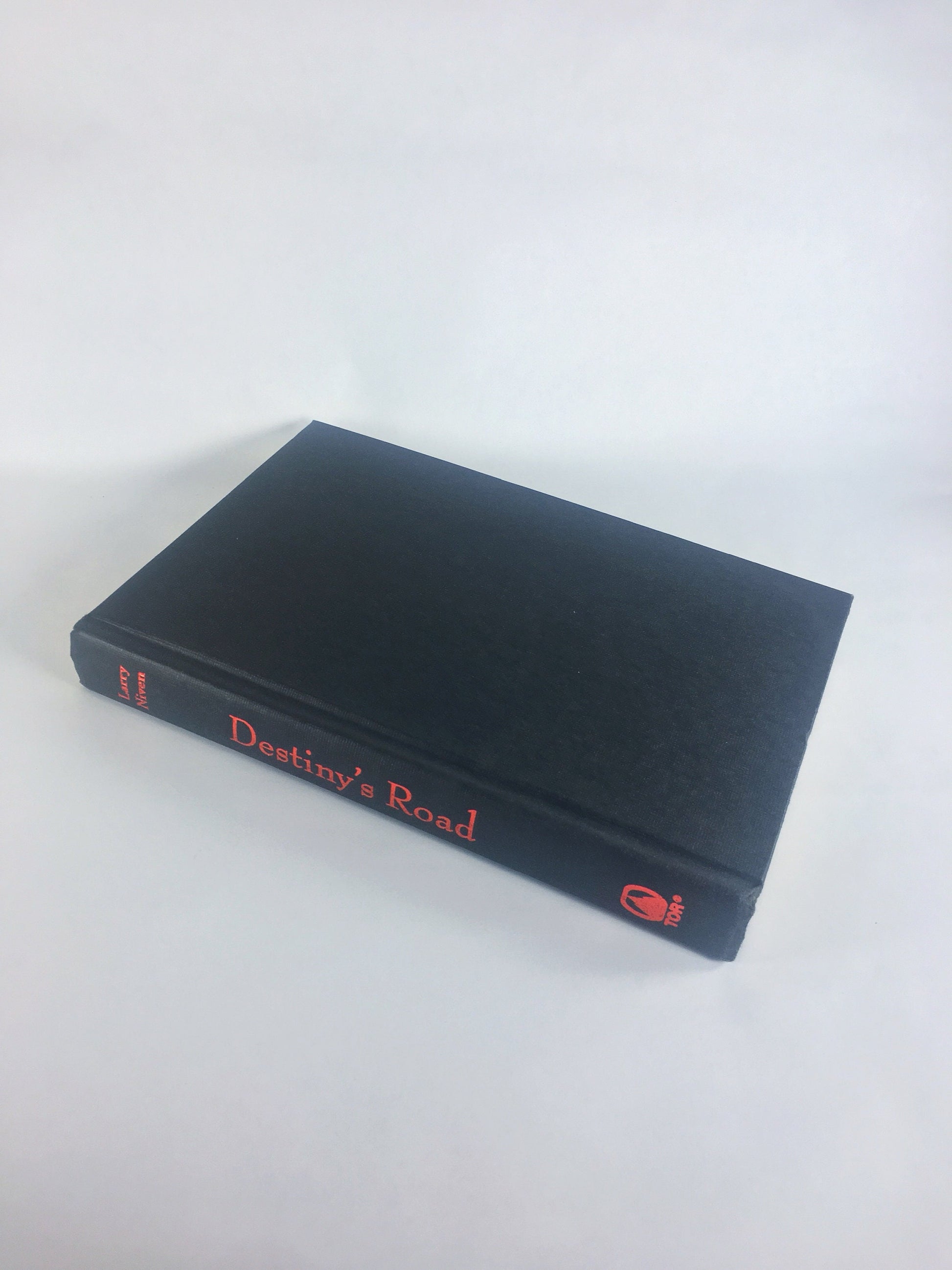 Destiny's Road FIRST EDITION vintage black book by Larry Niven circa 1997. Scifi story of a man living on a long abandoned Earth colony