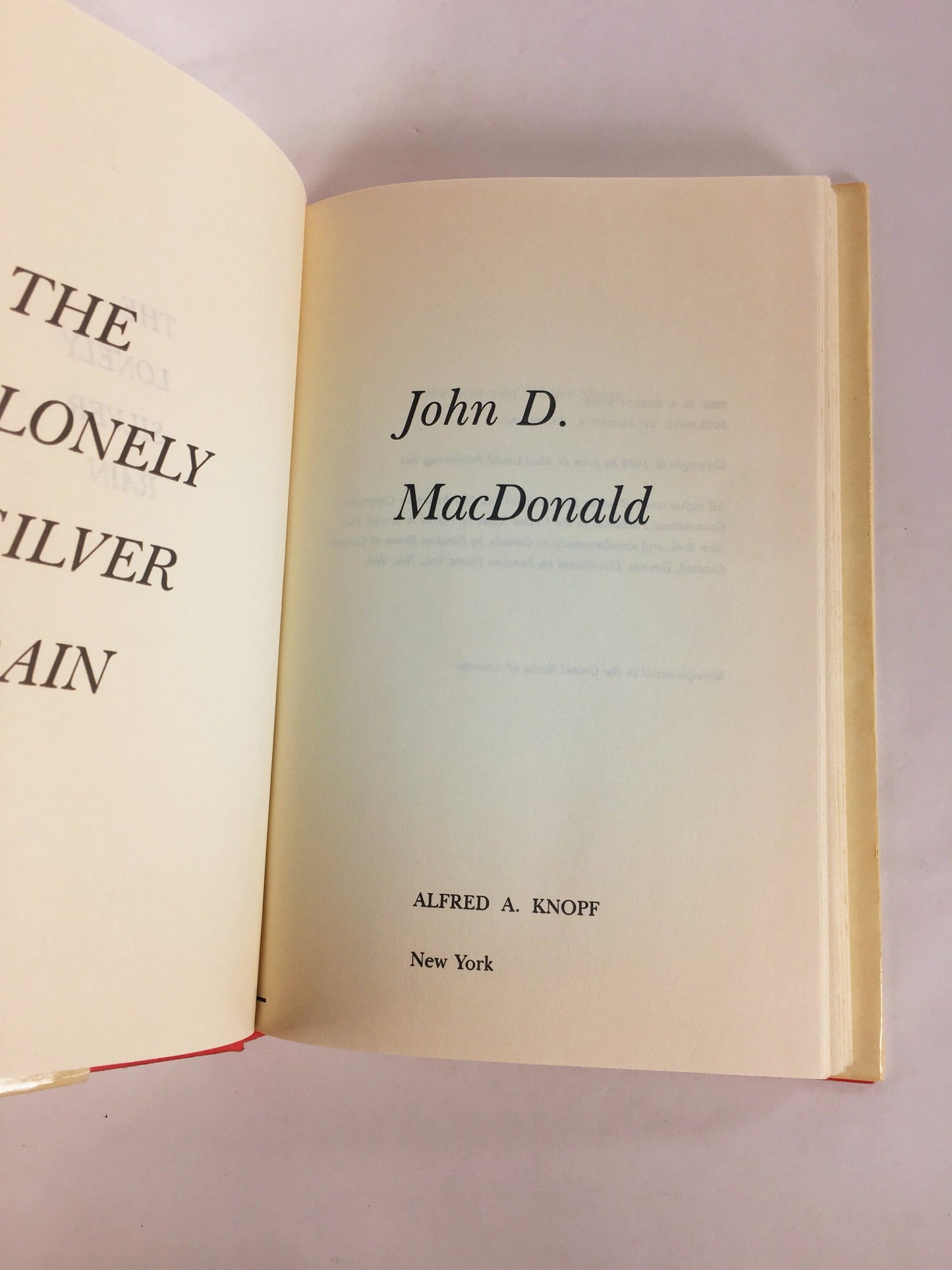 Lonely Silver Rain by John D MacDonald. Vintage book circa 1985 Final novel in Travis McGee series. Graphic sex & violence. hardboiled crime