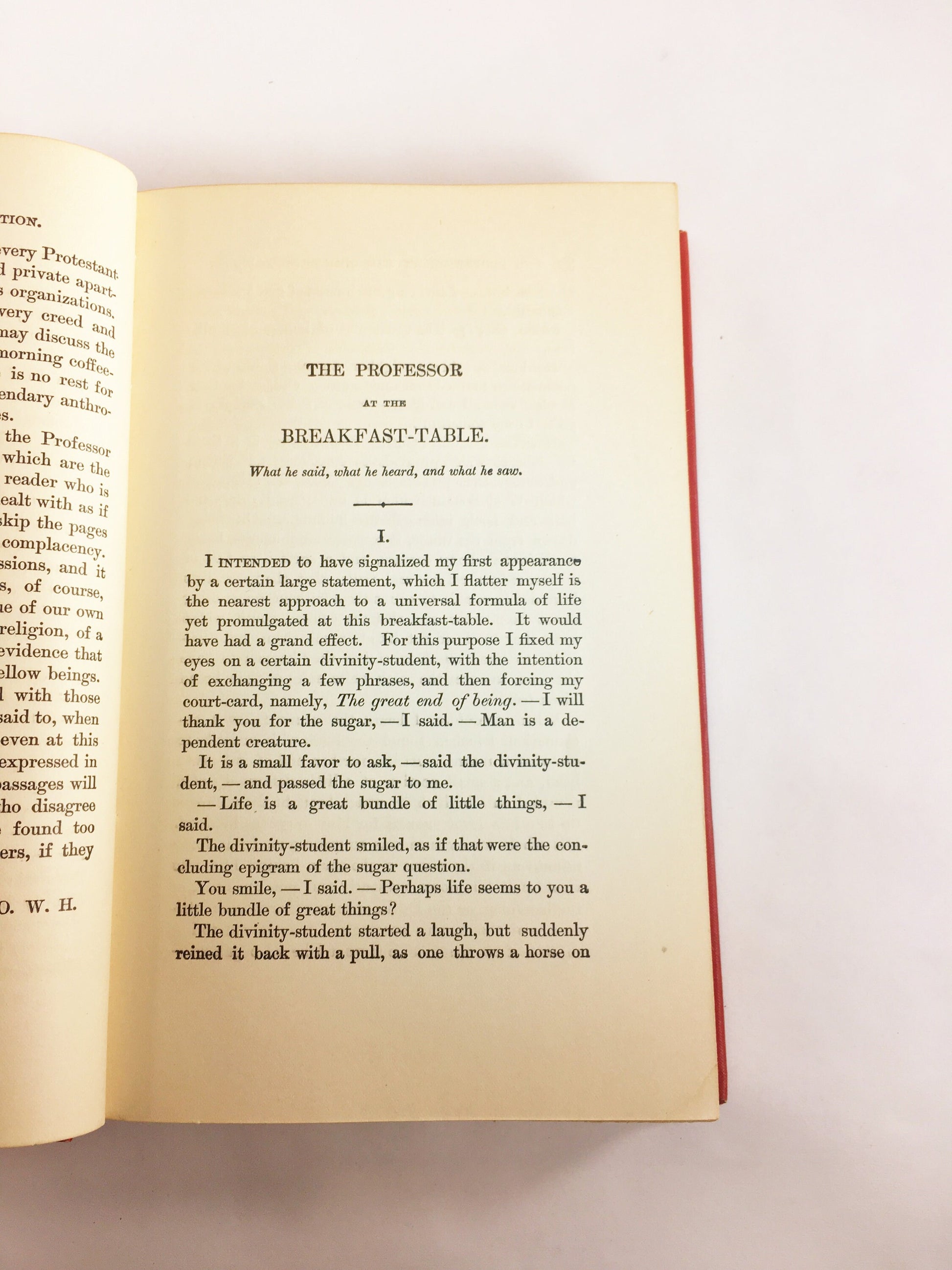 1892 Oliver Wendell Holmes The Autocrat Professor at the Breakfast Table. Vintage red book of a collection of essays. Decor prop staging