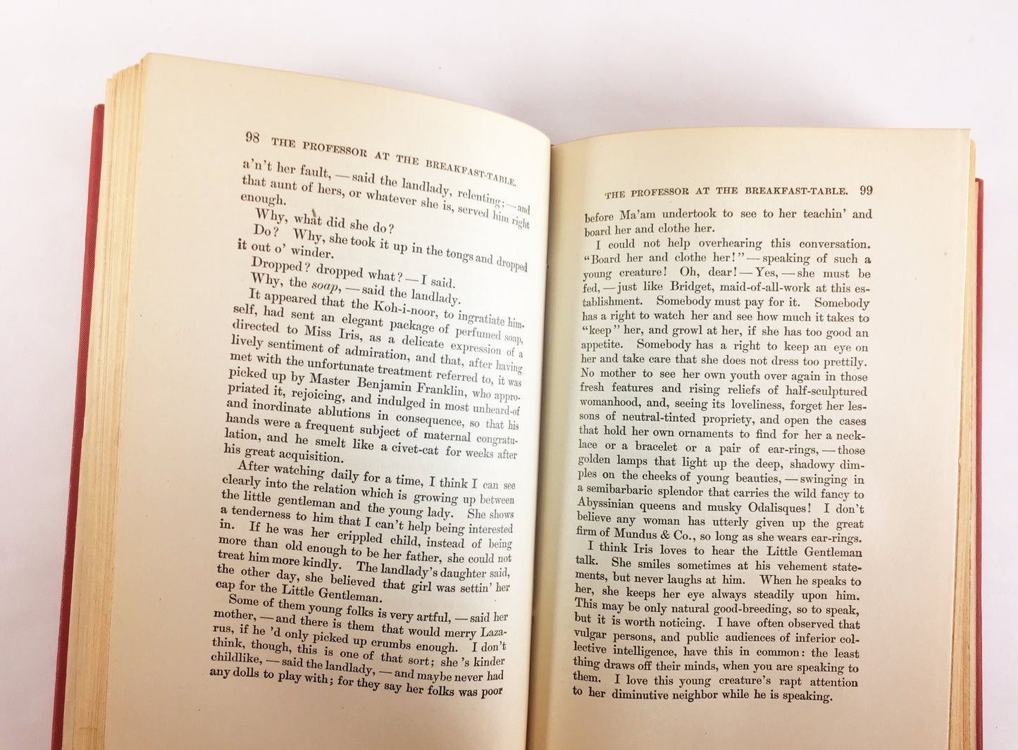 1892 Oliver Wendell Holmes The Autocrat Professor at the Breakfast Table. Vintage red book of a collection of essays. Decor prop staging
