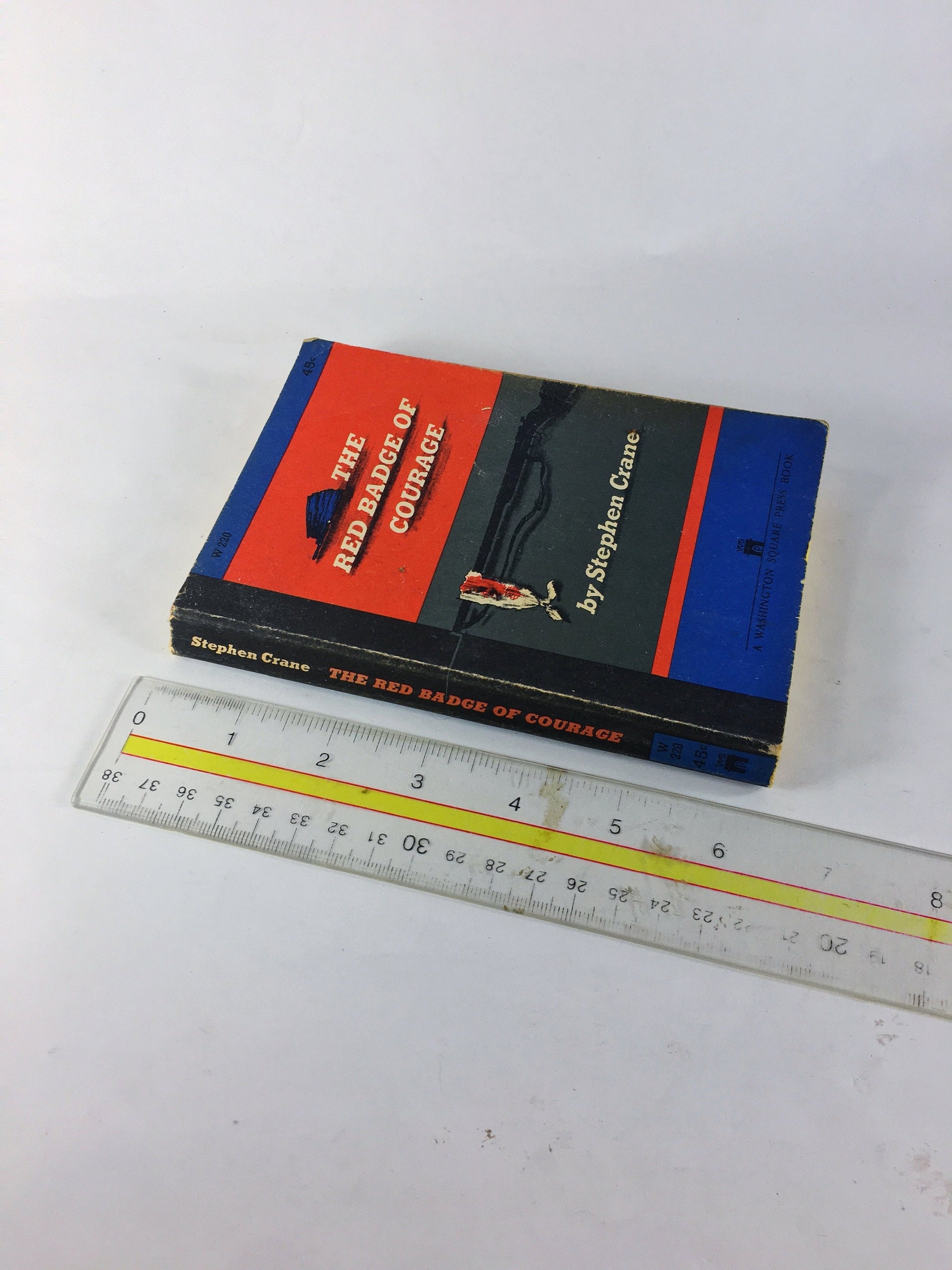 1961 Red Badge of Courage by Stephen Crane. Vintage Washington Square paperback book. Blue red black home bookshelf decor. Civil War Union