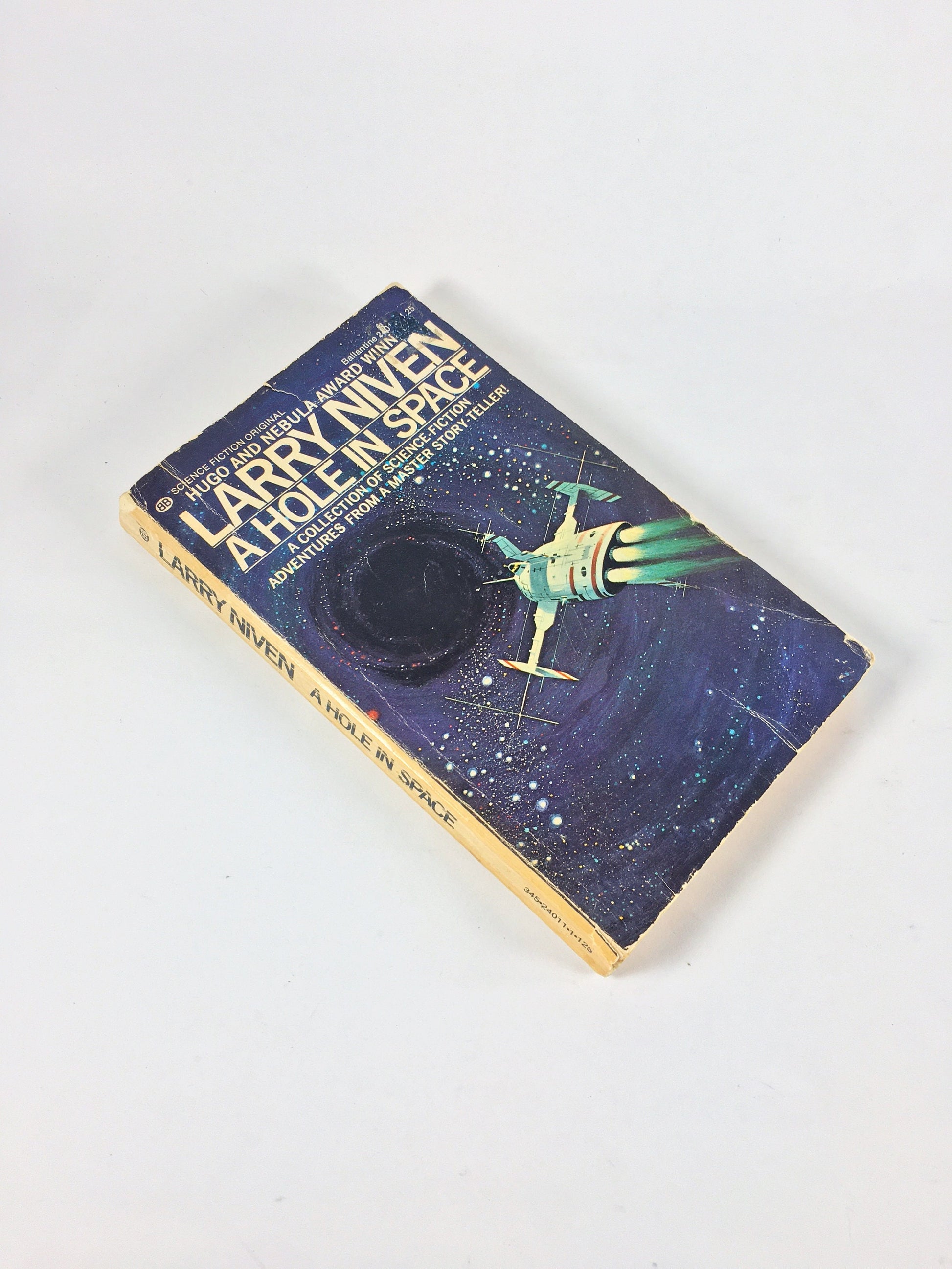 A Hole in Space Vintage paperback book by Larry Niven circa 1974. Science fiction gift. Theoretical physics. Hugo, Nebula & Locus Awards