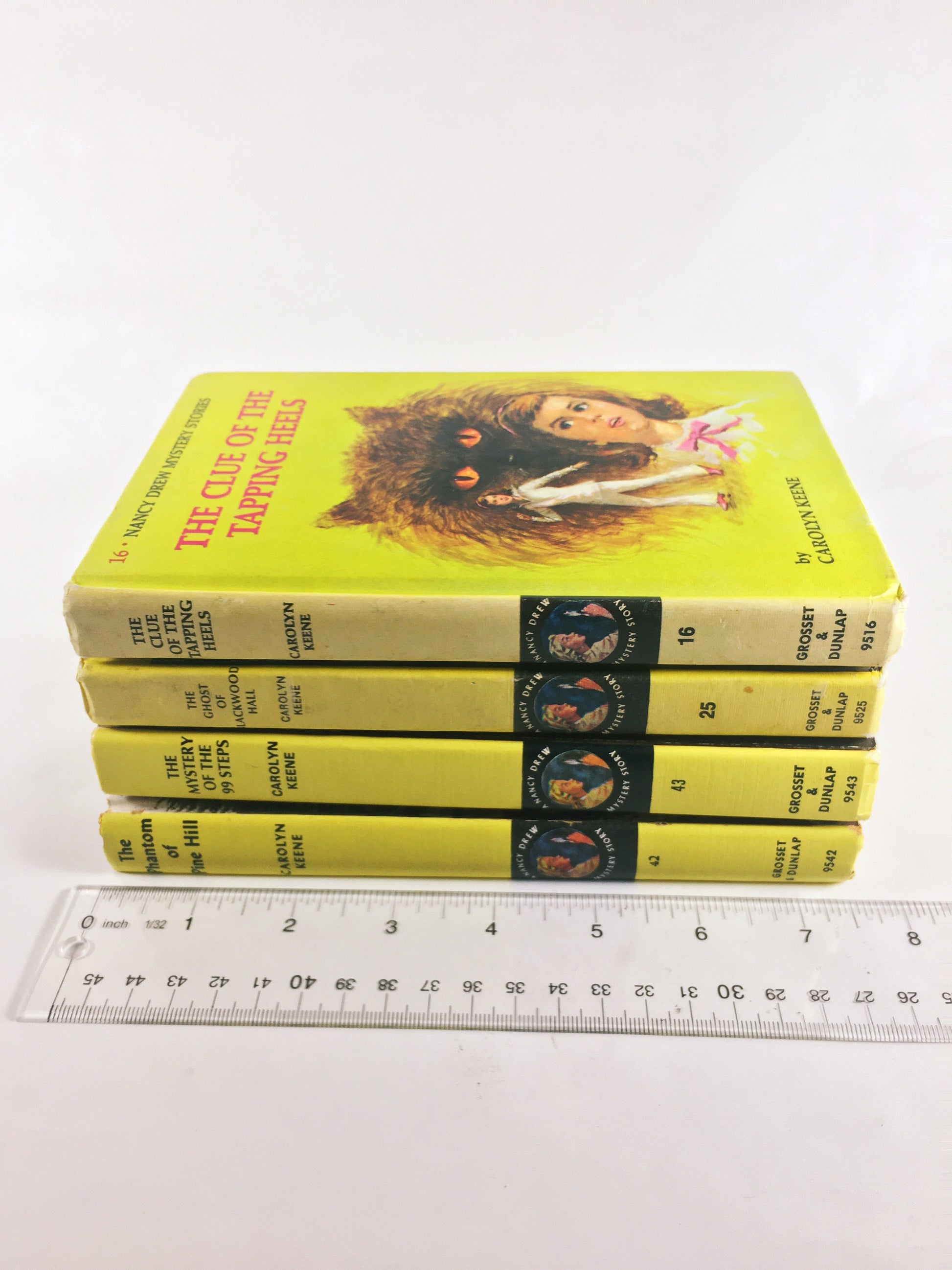 Nancy Drew Mystery Stories 1960s 1970 by Carolyn Keene. Vintage picture cover books with black & white endpapers. Teen tween reading yellow