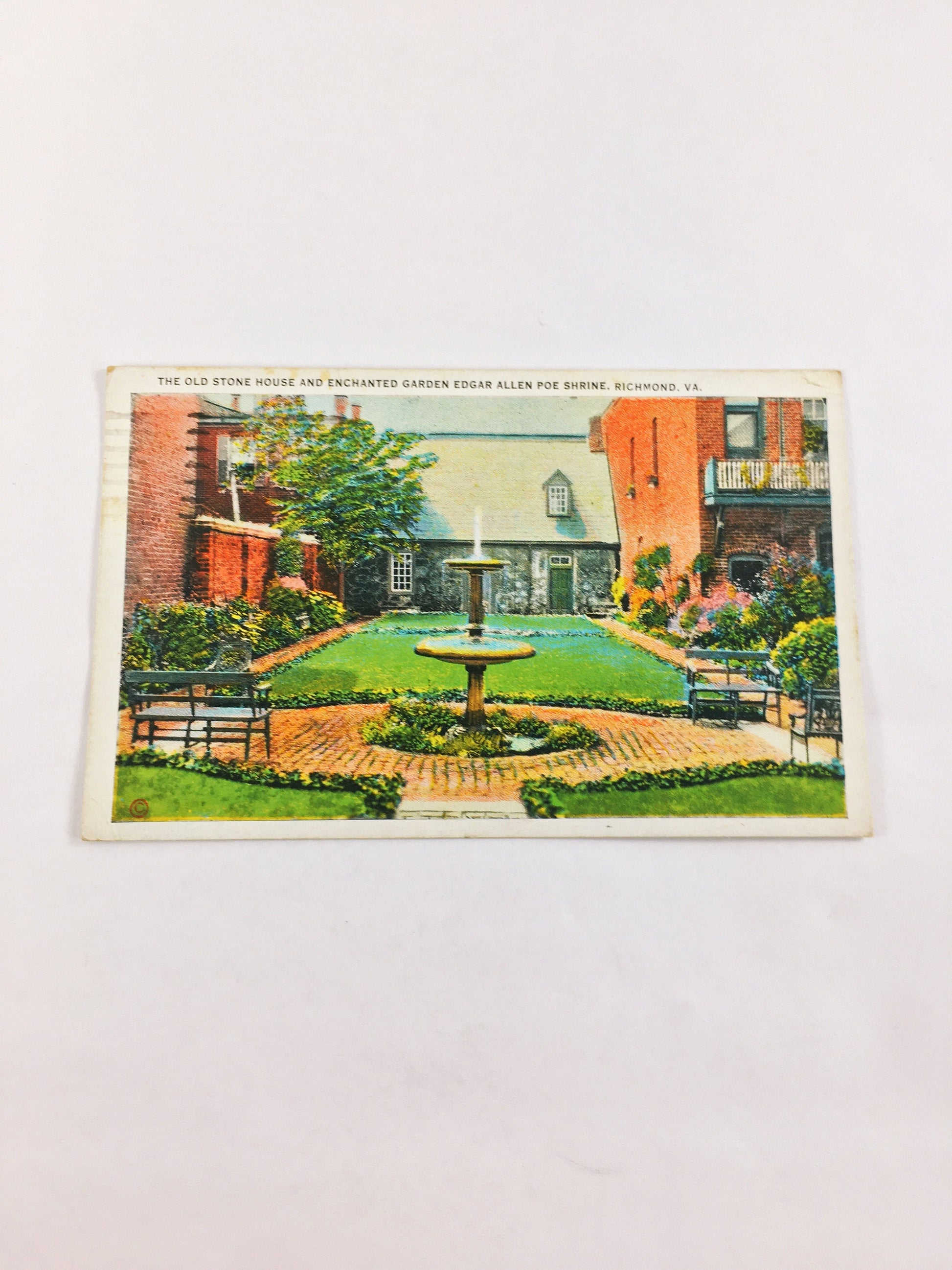 1930s Vintage Edgar Allan Poe shrine of house and enchanted garden linen postcard. Old Stone House in Richmond Virginia