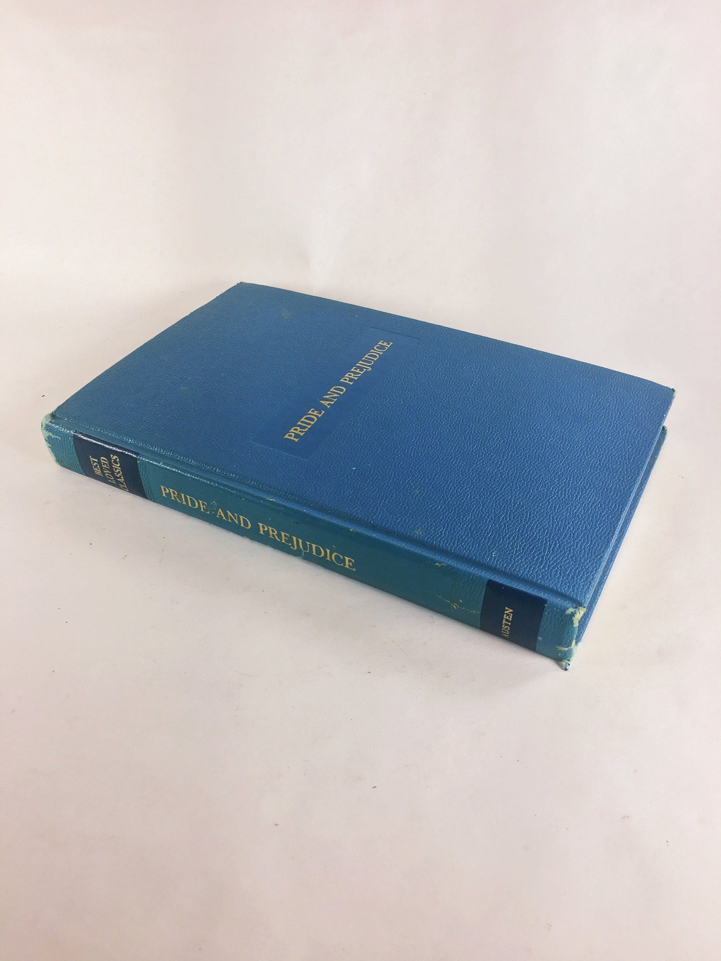 Alice in Wonderland, Pride & Prejudice Robinson Crusoe Huckleberry Finn Vintage Best Loved Classics sky blue book set circa 1949.