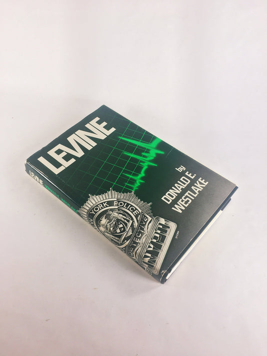 SIGNED first edition vintage book Levine by Donald Westlake, as Richard Stark, circa 1984. A crime novel featuring the gritty tales of detective Abe Levine. A rare collectible for fans of classic crime fiction