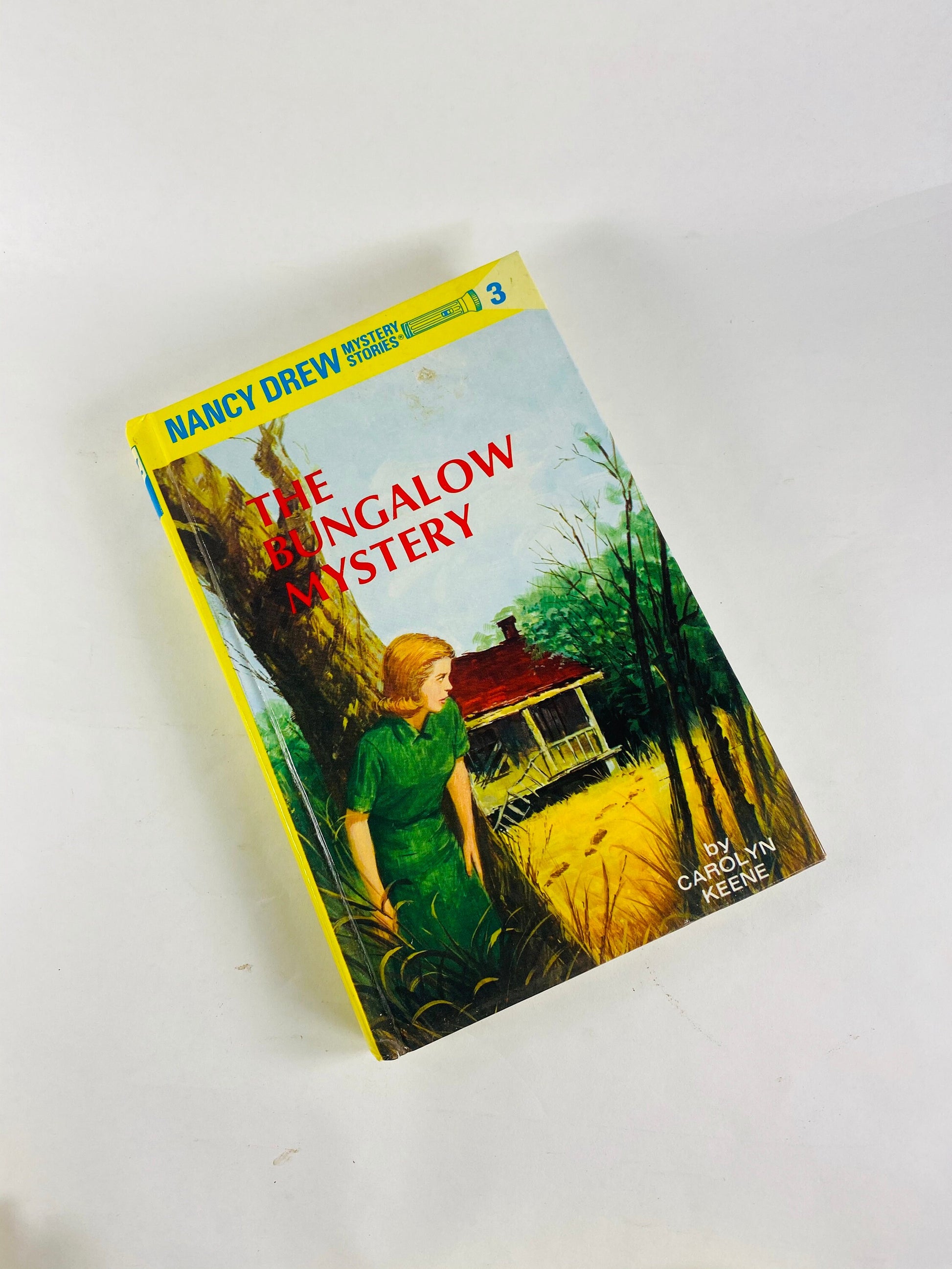 Nancy Drew Mystery Stories vintage books in good condition by Carolyn Keene. Glossy yellow spine hardcovers. home reading elementary middle